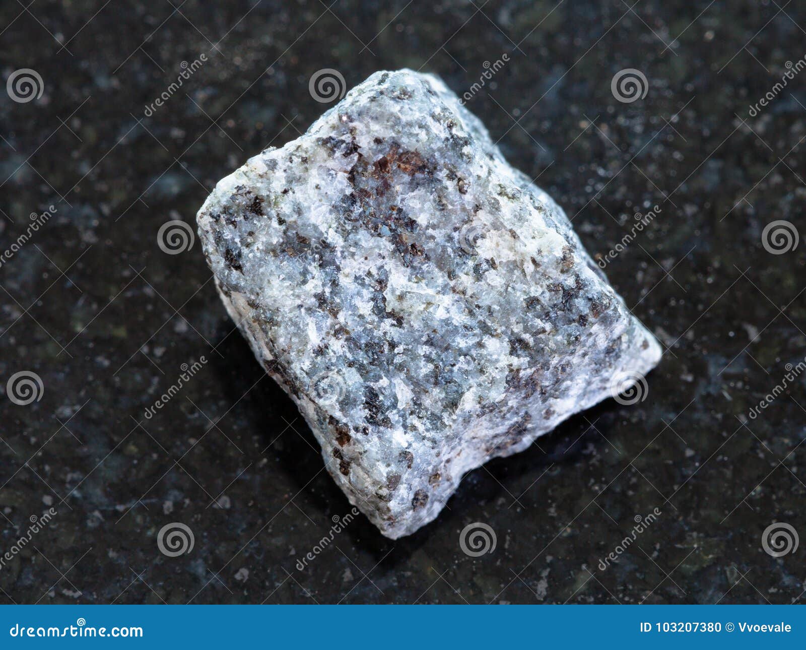 raw gabbro stone on dark background