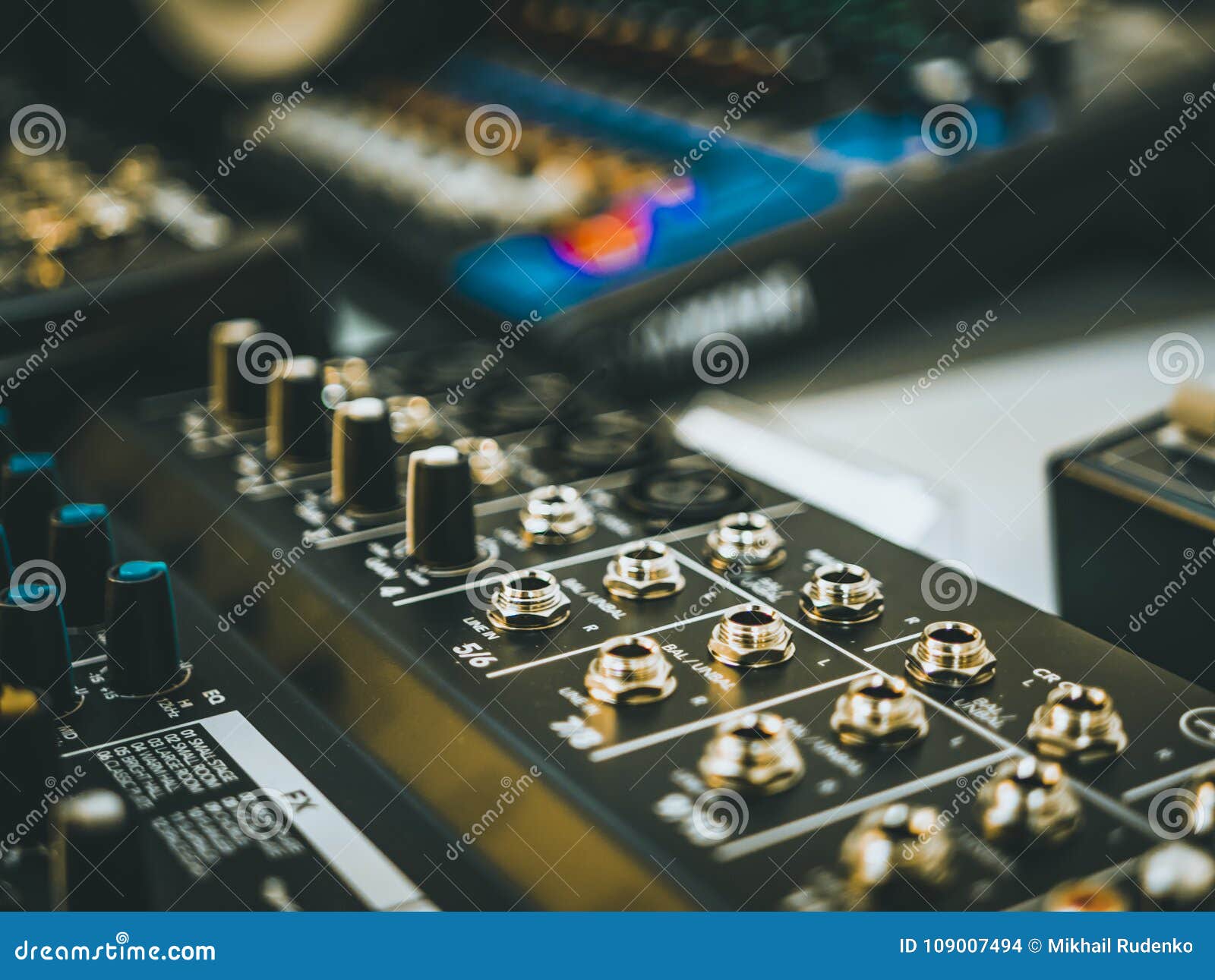 Professional Audio Equipment with Faders Knobs and Buttons Stock Photo