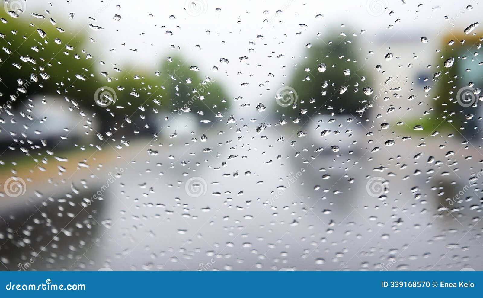 rain droplets on glass with blurred background