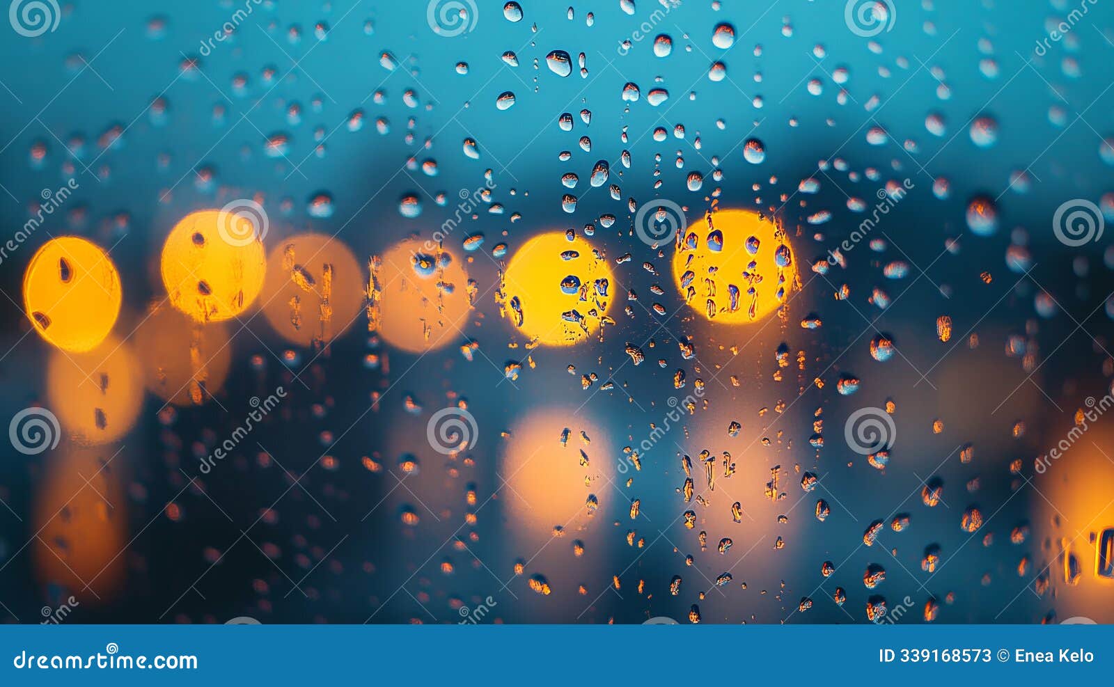 rain droplets on glass with blurred background