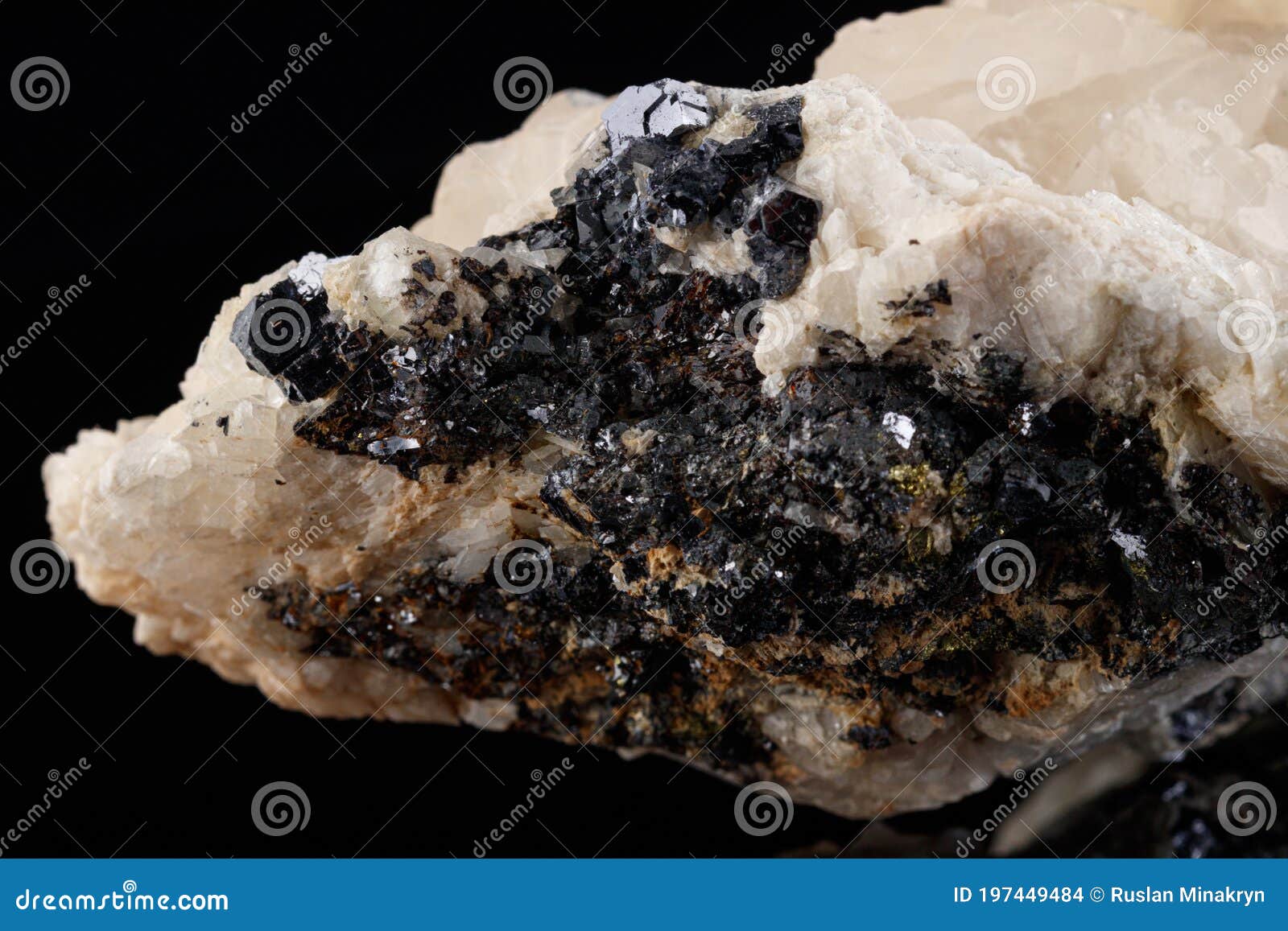 macro stone mineral quartz on galena on a black background