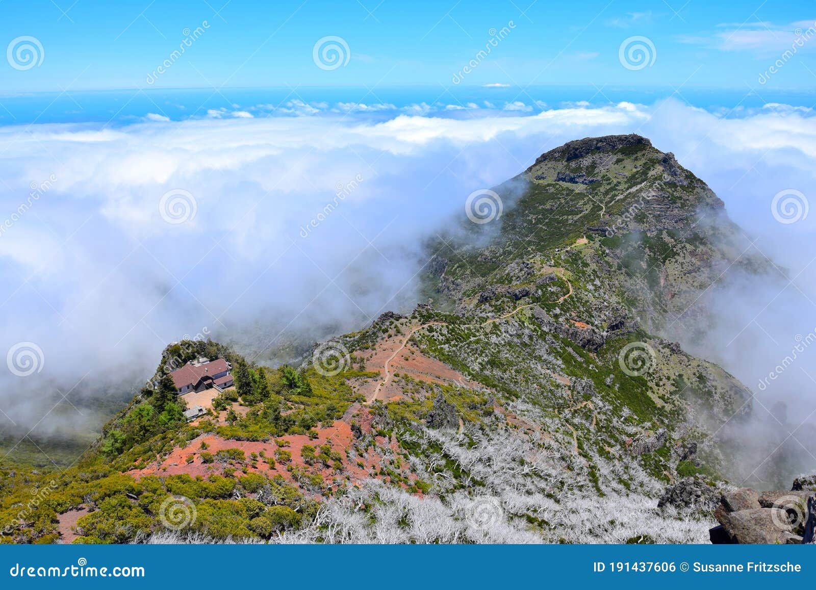 madeiran landscape with high mountains, a trail and casa de abrigo. portugal