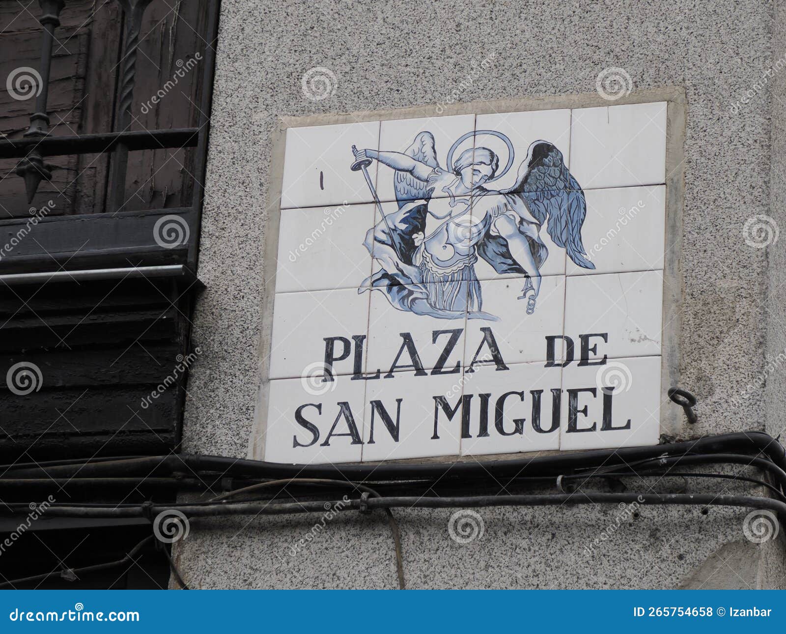 madrid, spain - december 14, 2022: street name plaza de san miguel sign on in madrid, capital of spain renowned for its rich