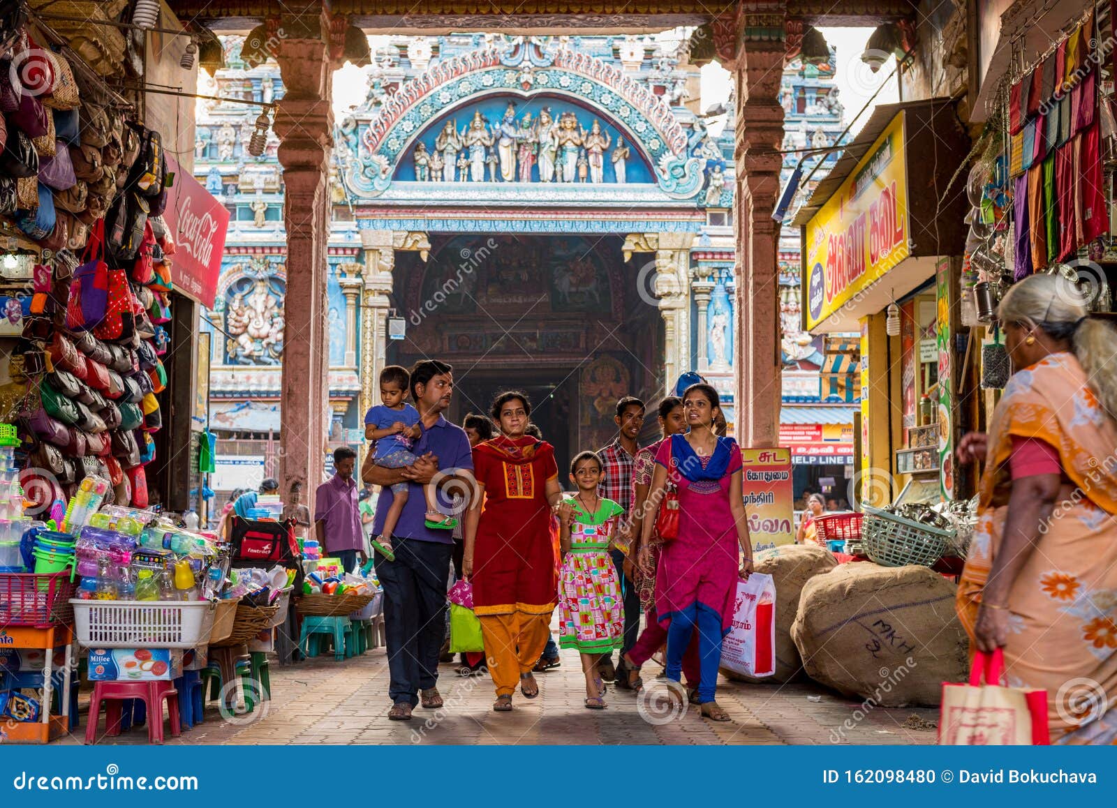 Madurai, Tamil Nadu / India: Indian Family Walks Through An Arch ...