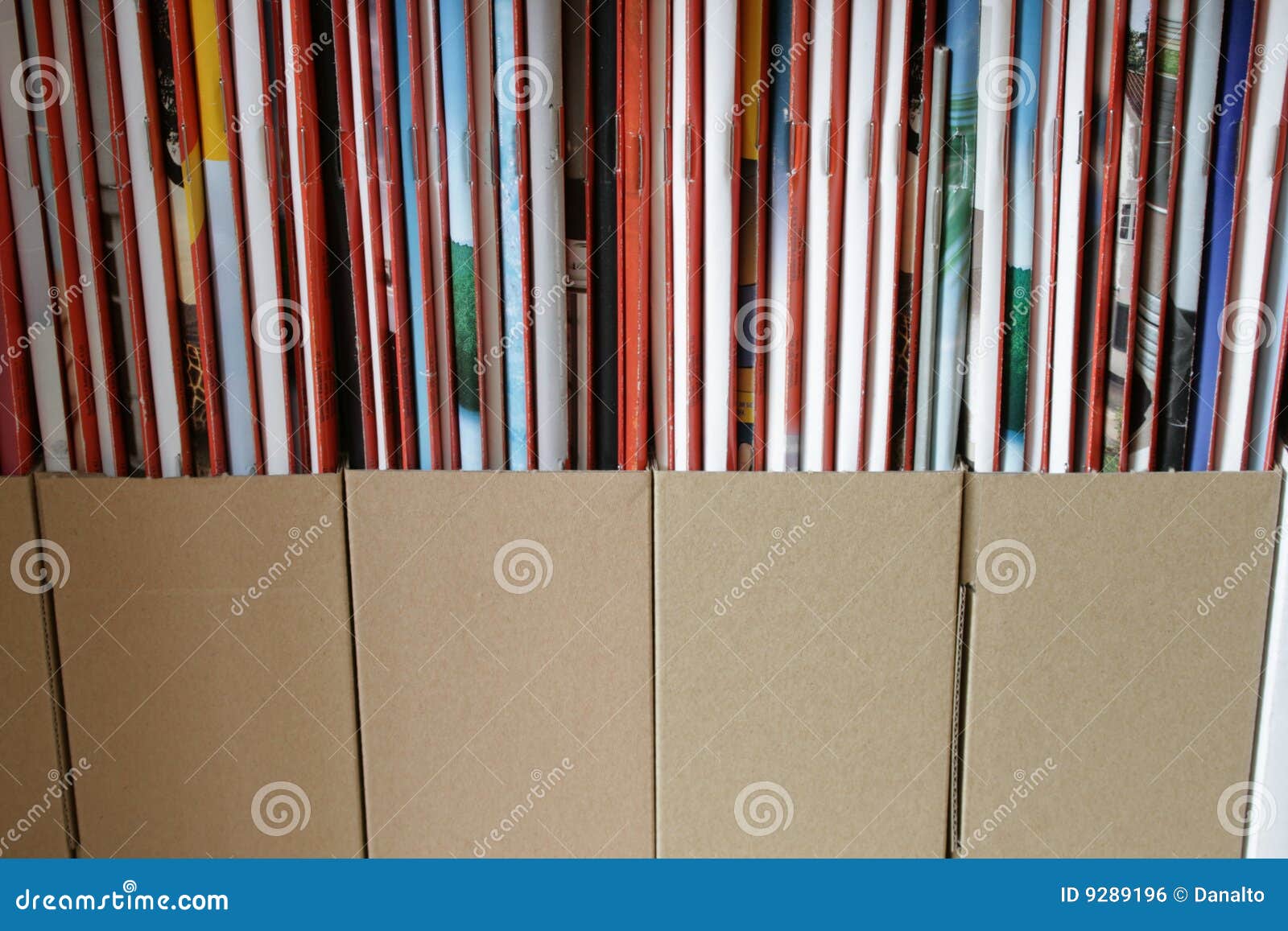 Magazines in storage boxes stock photo. Image of horizontal 9289196