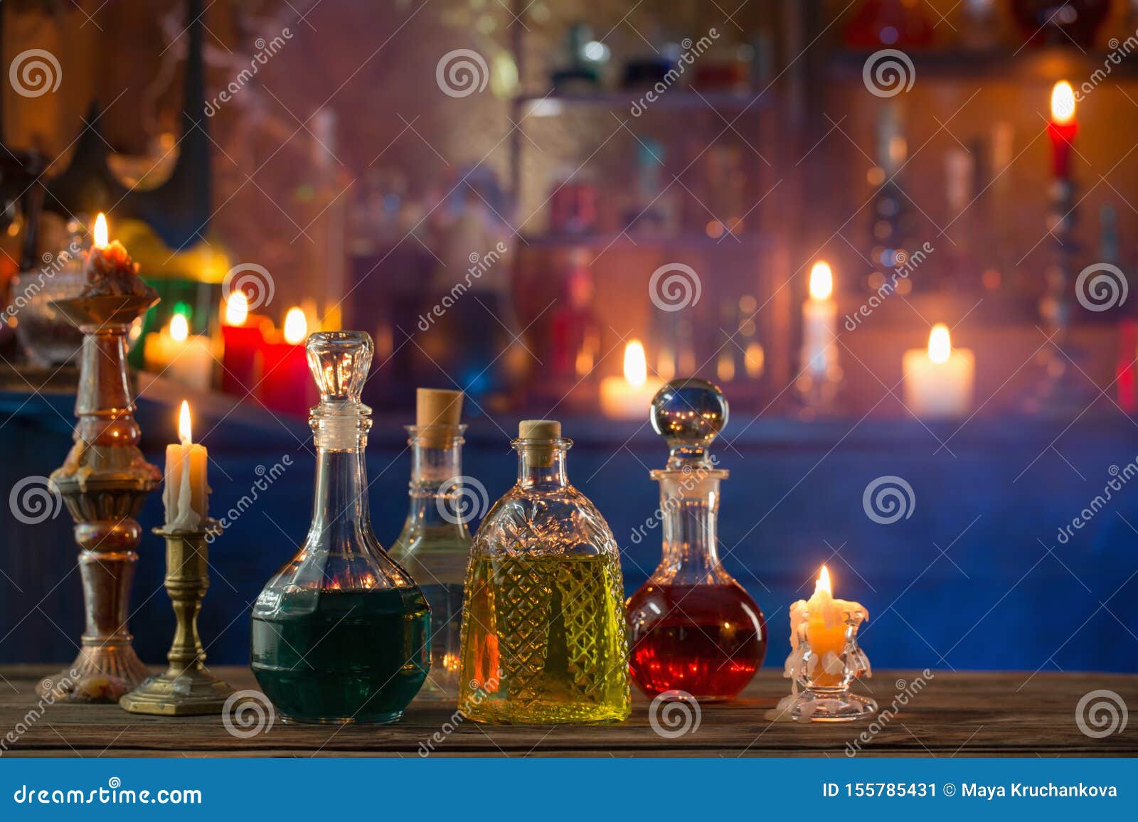Magic Potions in Bottles on Wooden Background Stock Image - Image of