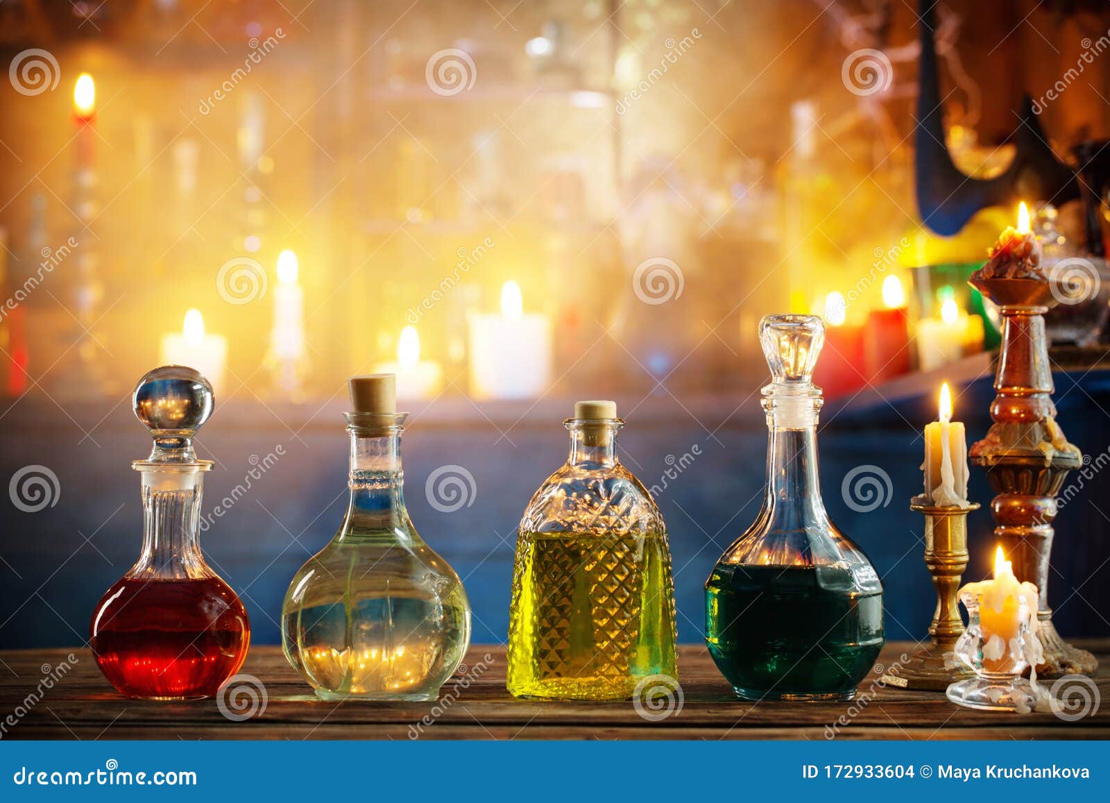 Magic Potions in Bottles on Wooden Background Stock Photo - Image of