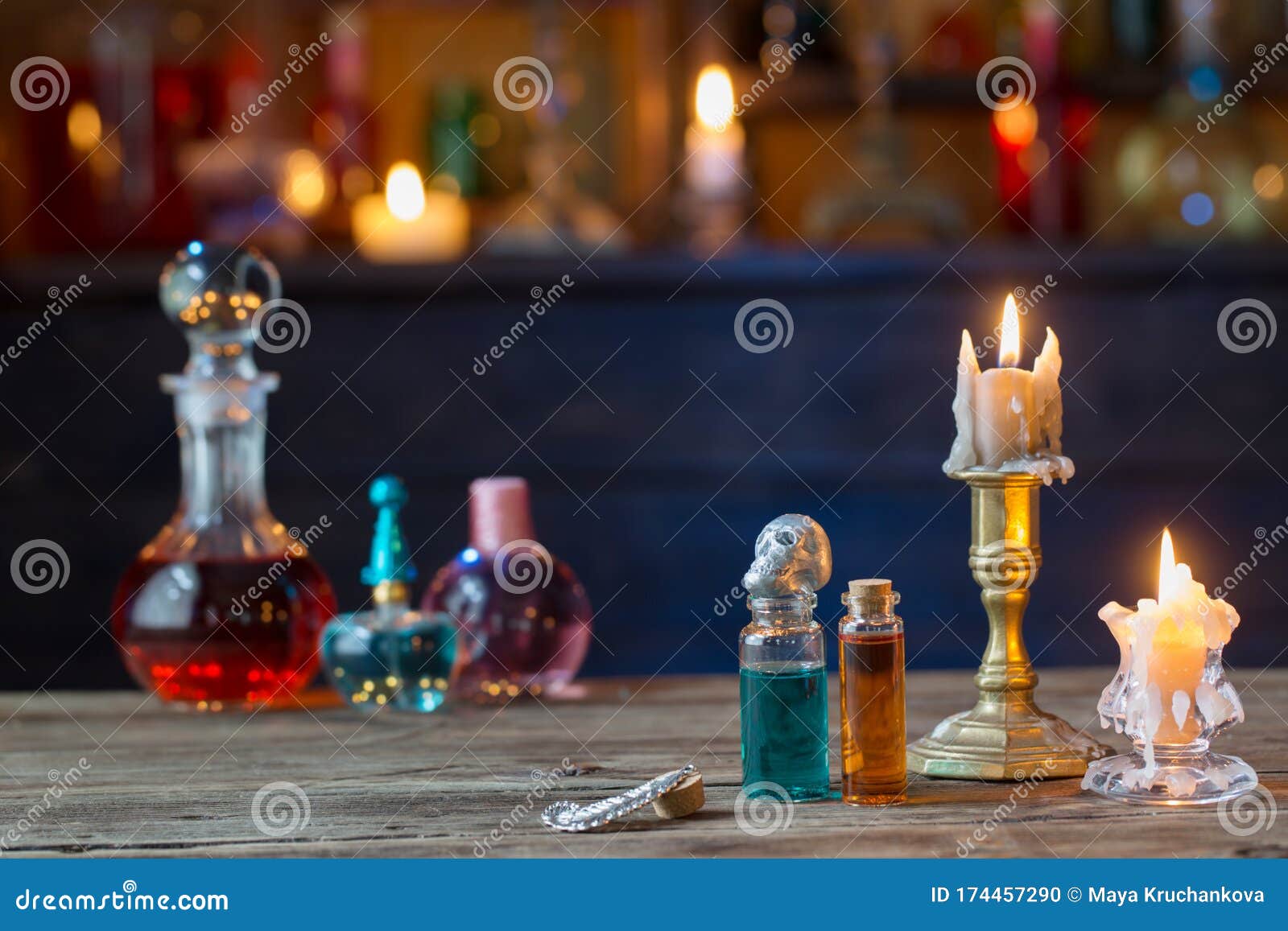 Magic Potions in Bottles on Wooden Table Stock Photo - Image of bottles