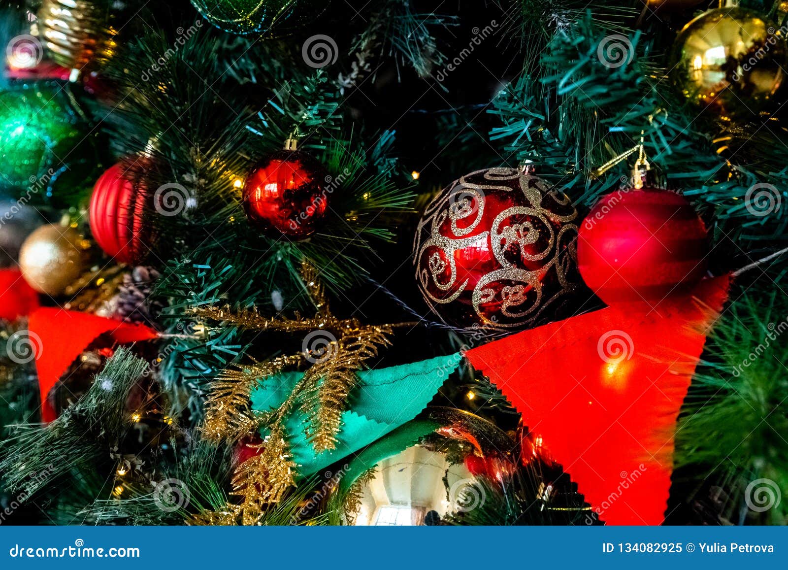 Magically Decorated Christmas Tree with Balls, Ribbons and Garlands on ...