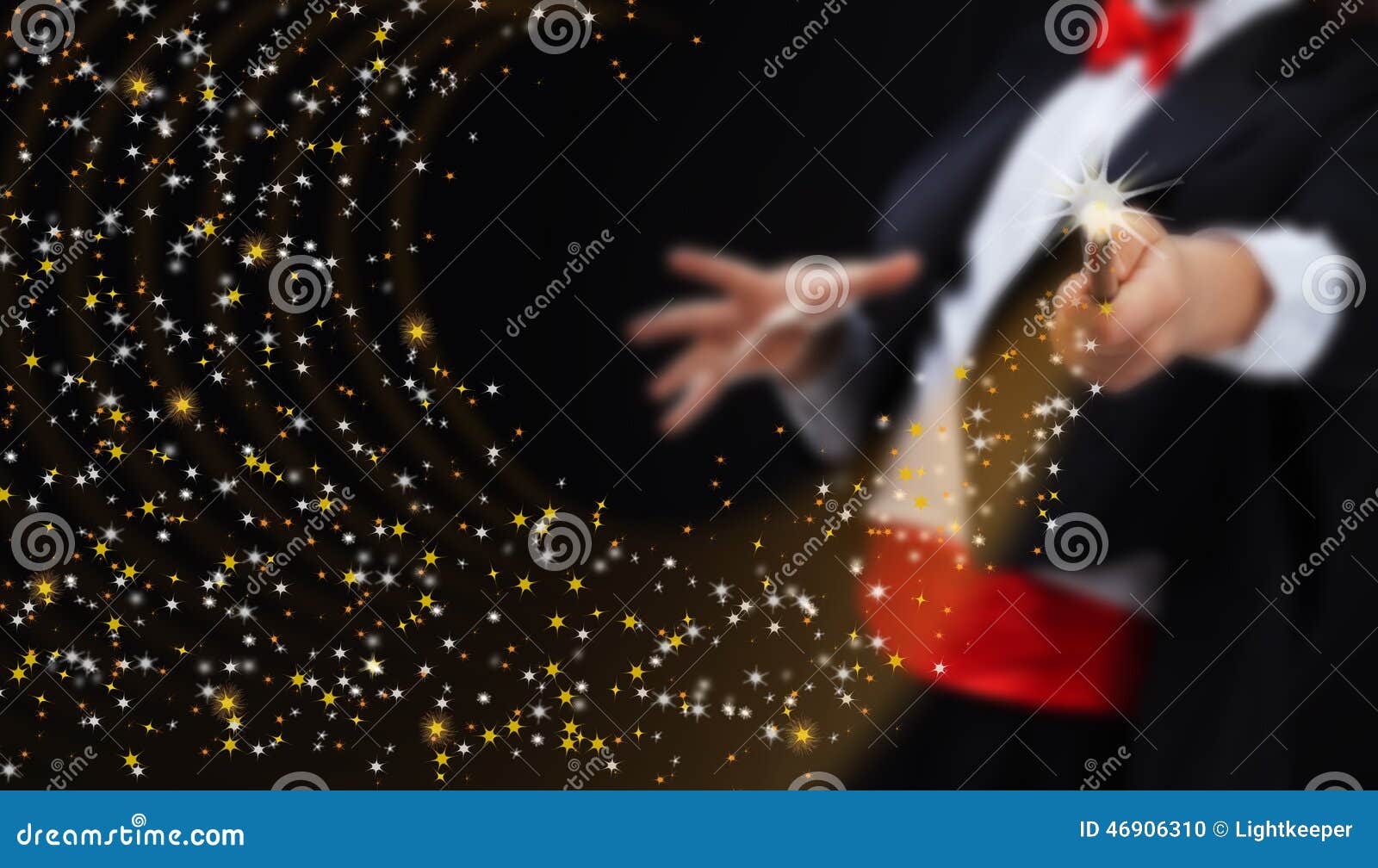 magician hands with sparkling stars