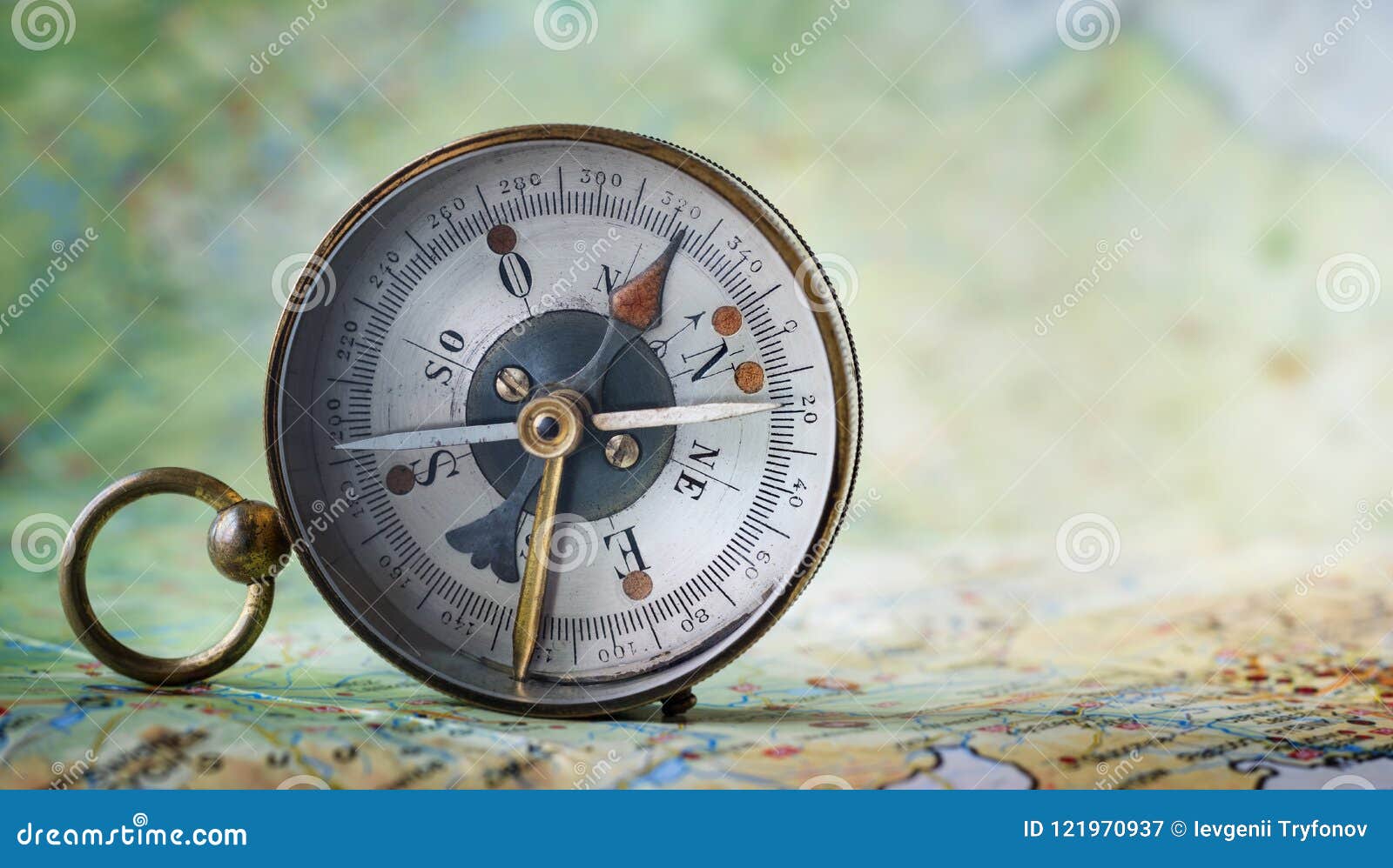 magnetic compass on world map.travel, geography, navigation, tou