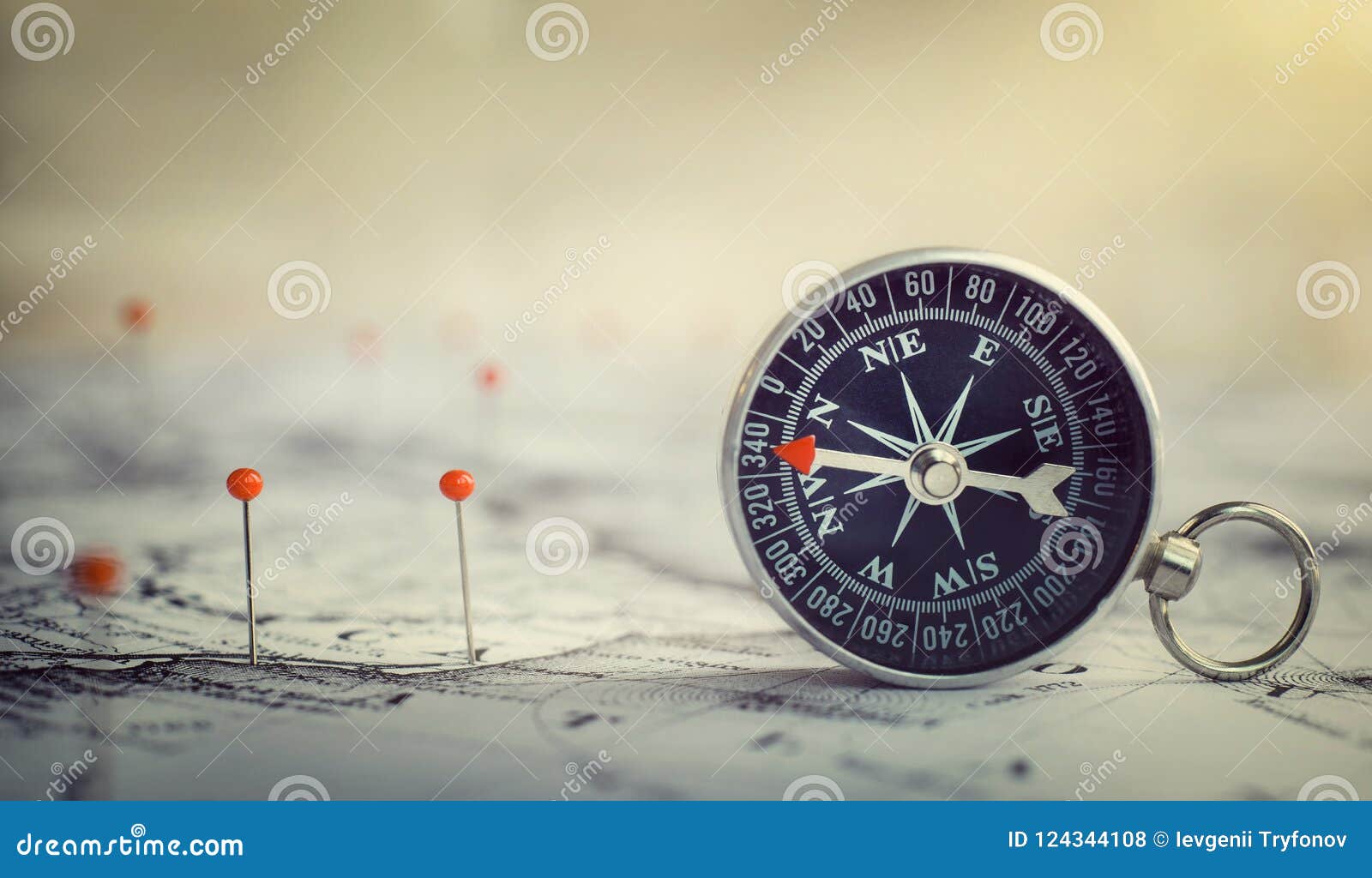 magnetic compass on world map.travel, geography, navigation, tourism and exploration concept background. macro photo. very