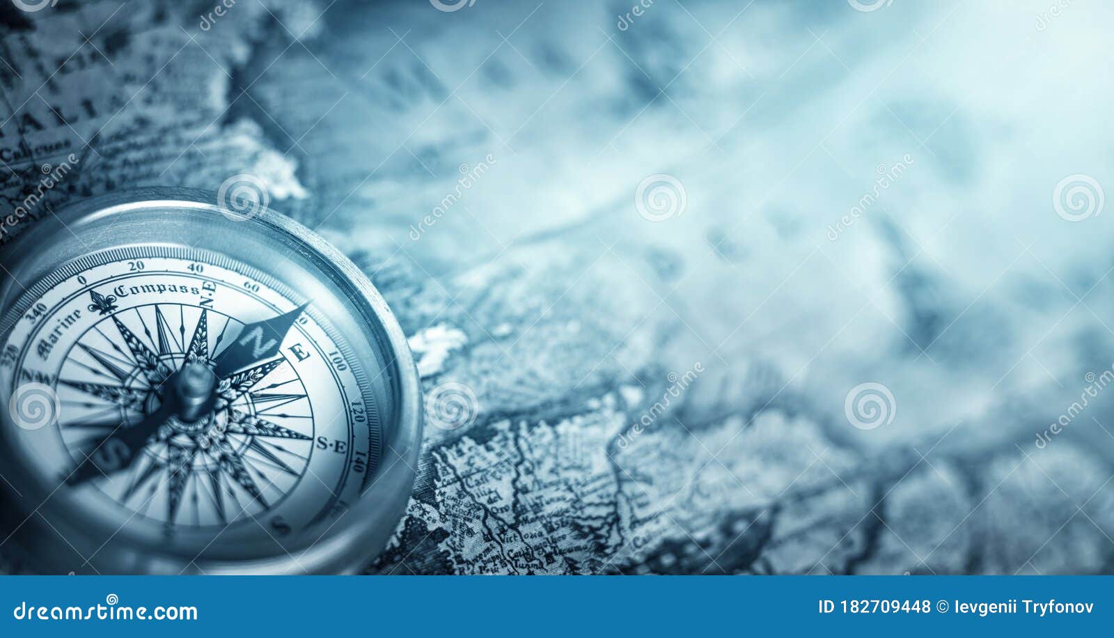 magnetic old compass on world map.travel, geography, navigation, tourism and exploration concept background. macro photo. very