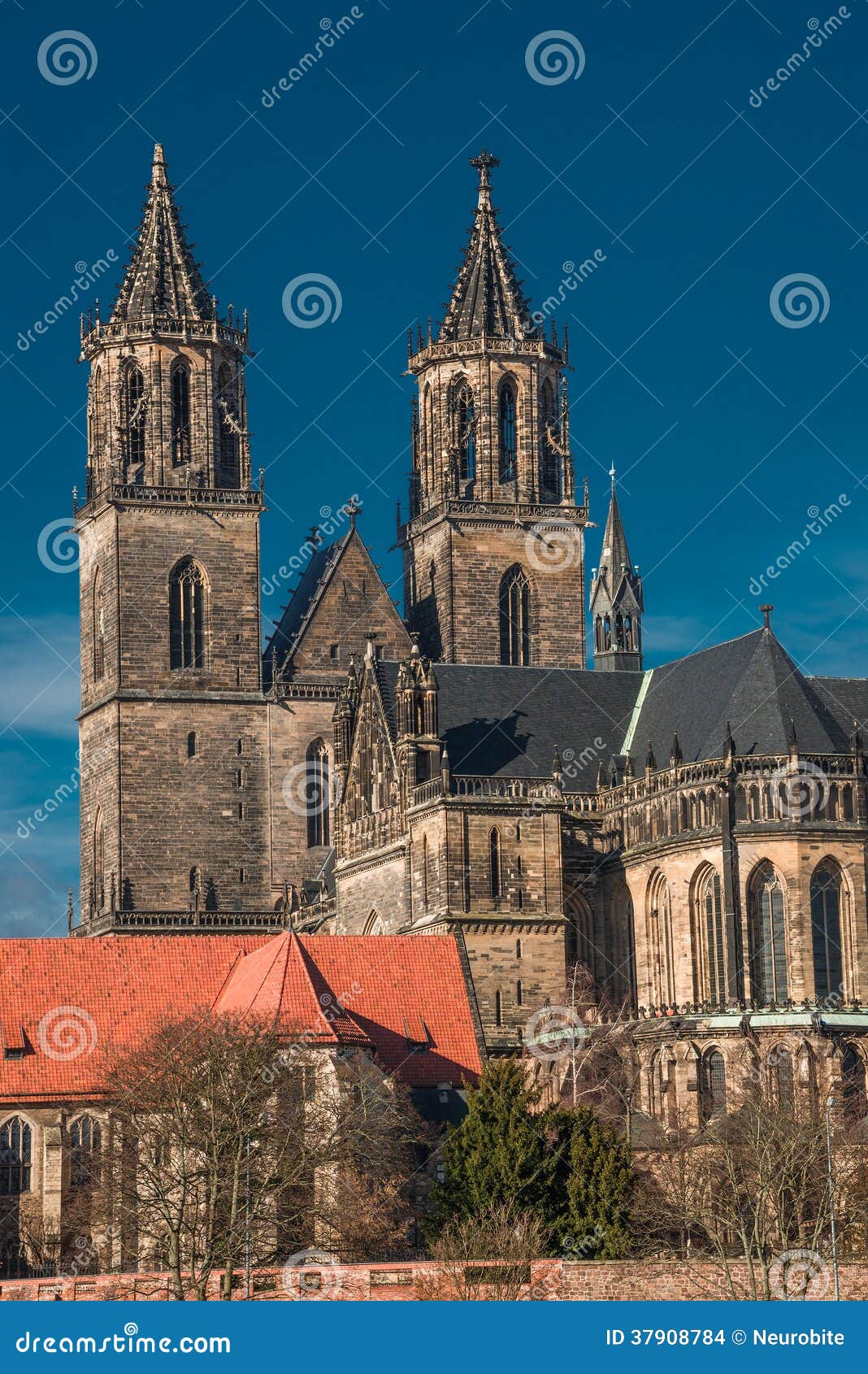 Magnificent Cathedral of Magdeburg at River Elbe with Blue Sky, Stock