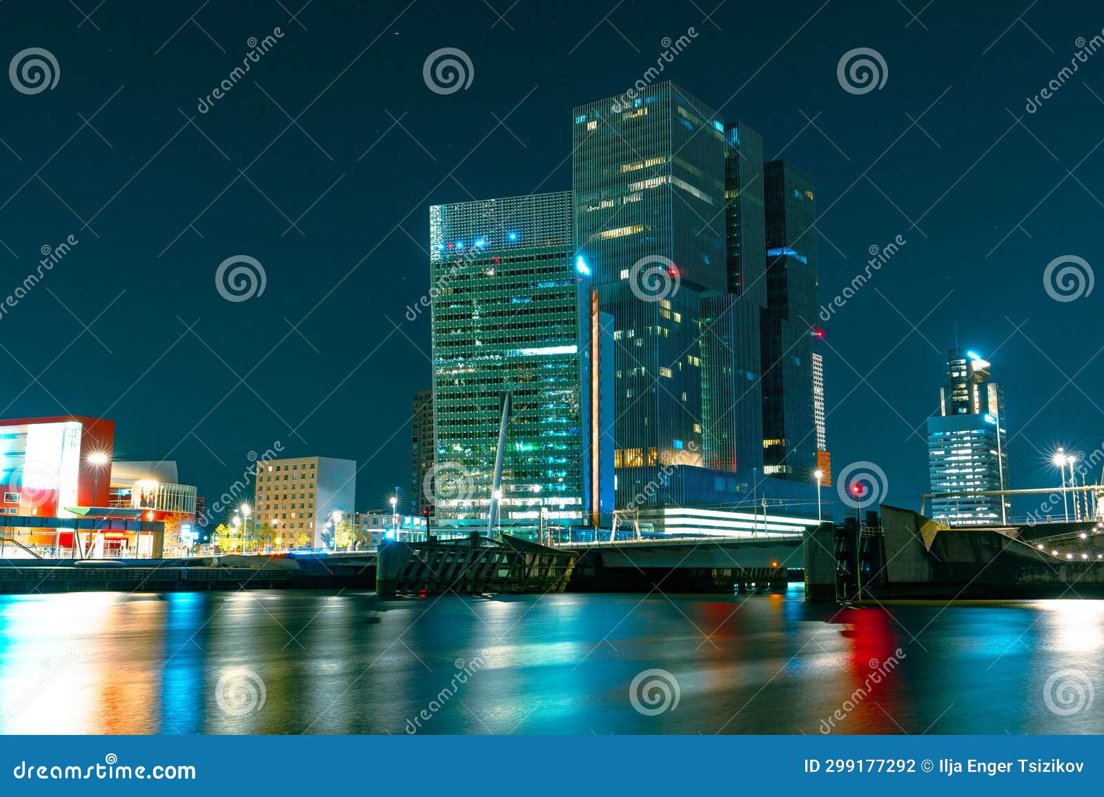 magnificent nocturnal scenery of rotterdam's high-rise architecture and starry night sky