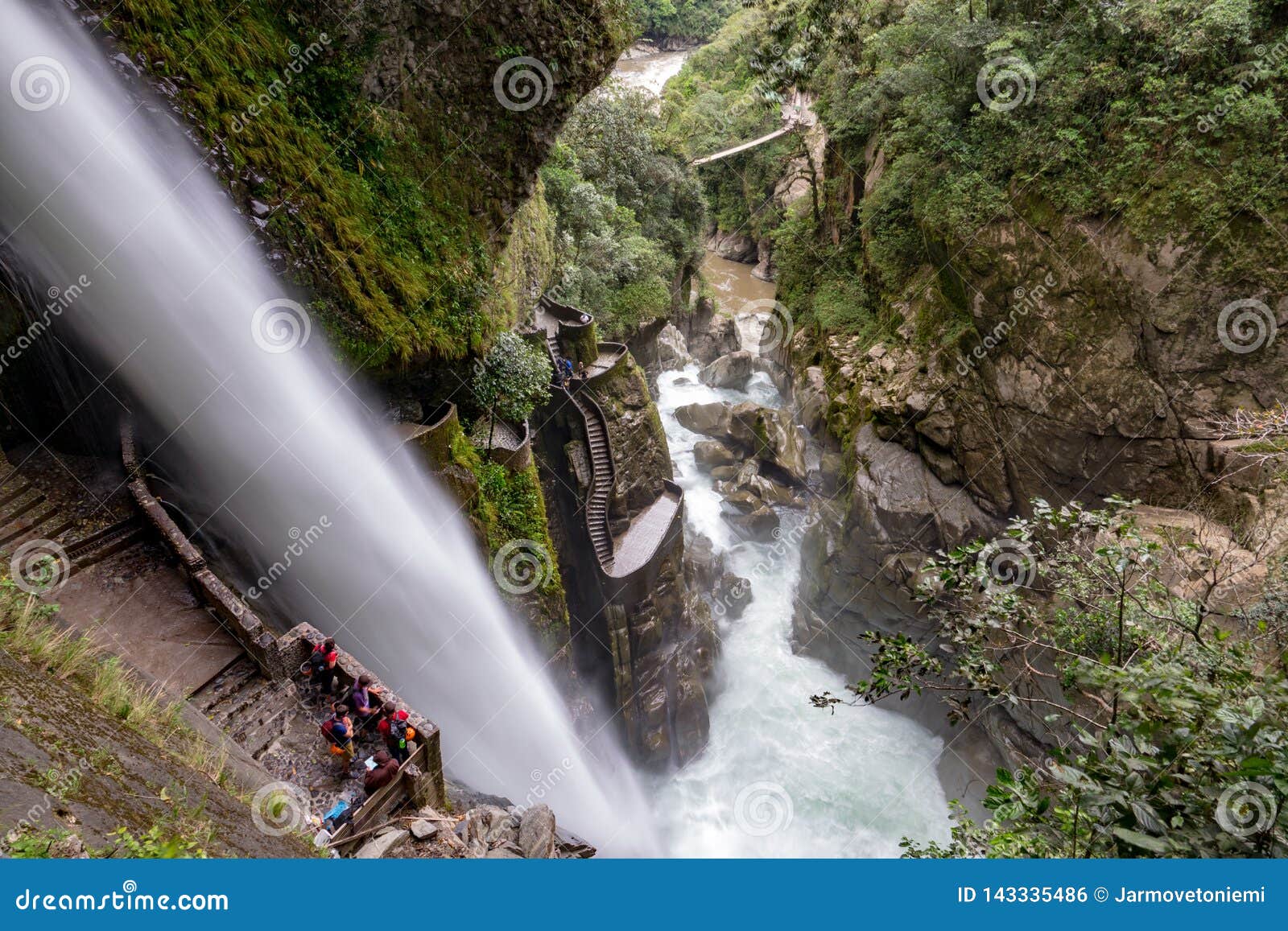 magnificent waterfall called pailon del diablo devil`s cauldron in banos, ecuador