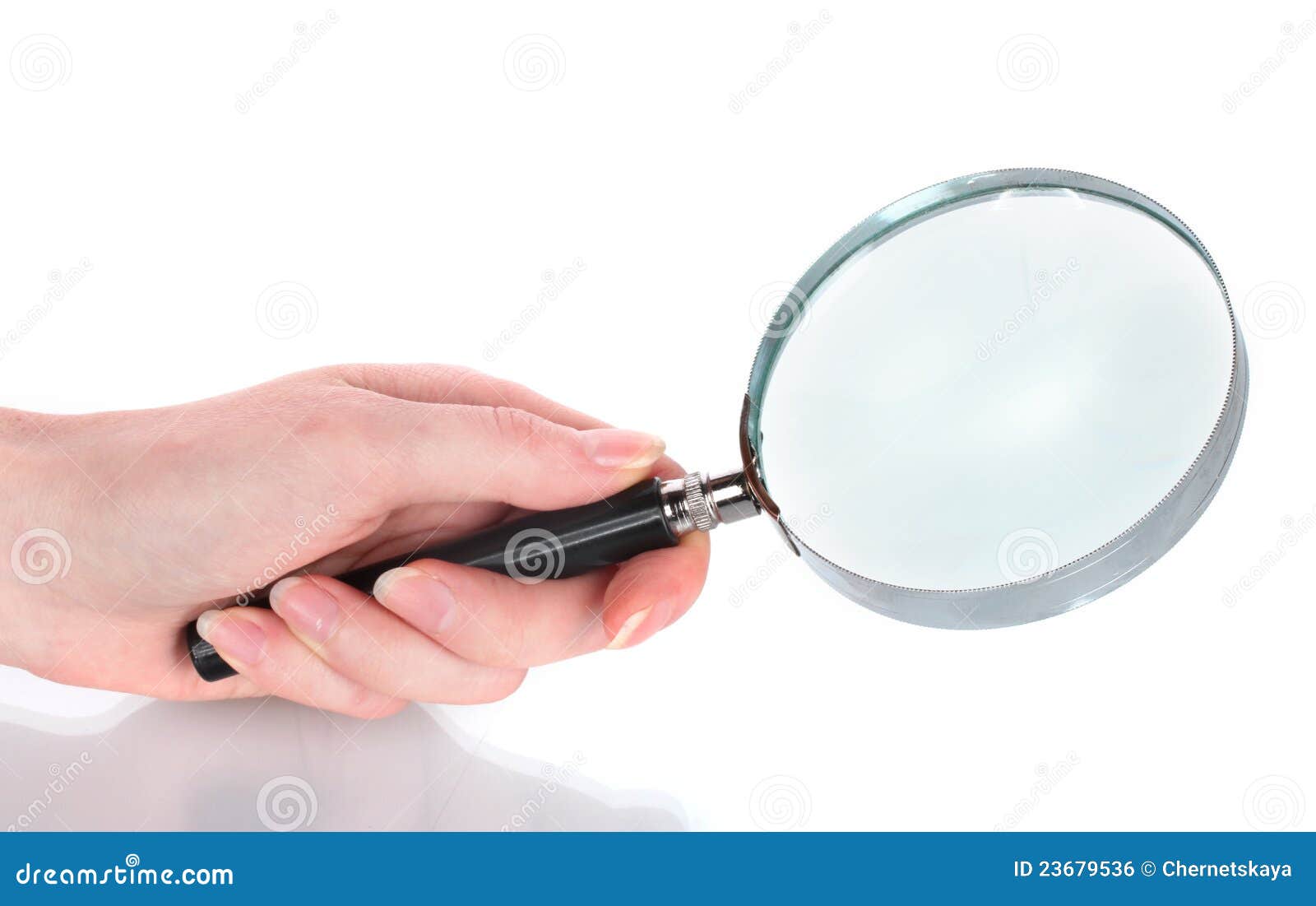 Magnifying glass in hand stock photo. Image of large 23679536