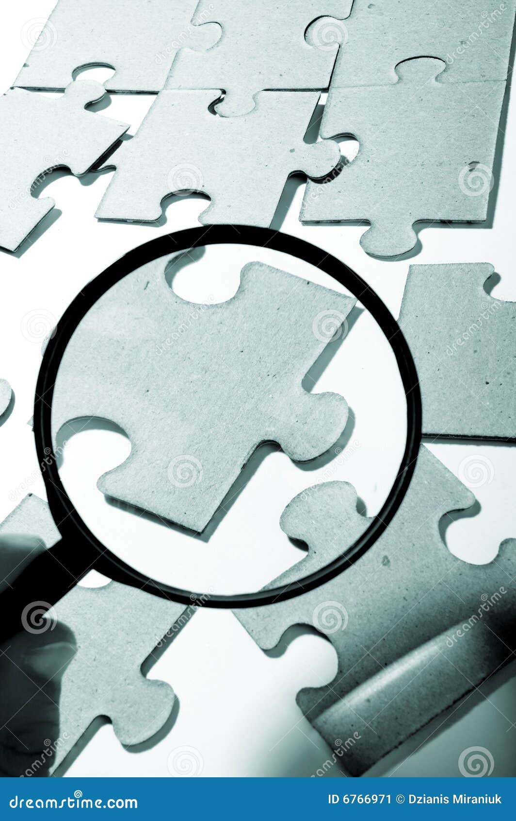 Magnifying glass, puzzle stock image. Image of solved 6766971