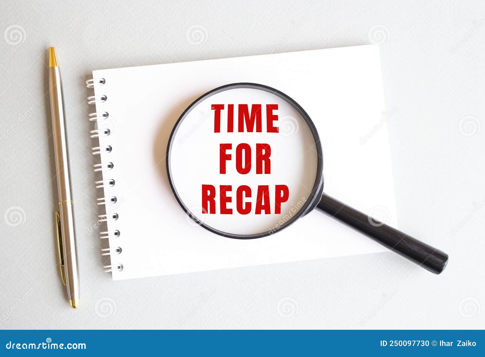 The Magnifying Glass Rests on the Pad and Shows TIME for RECAP on a