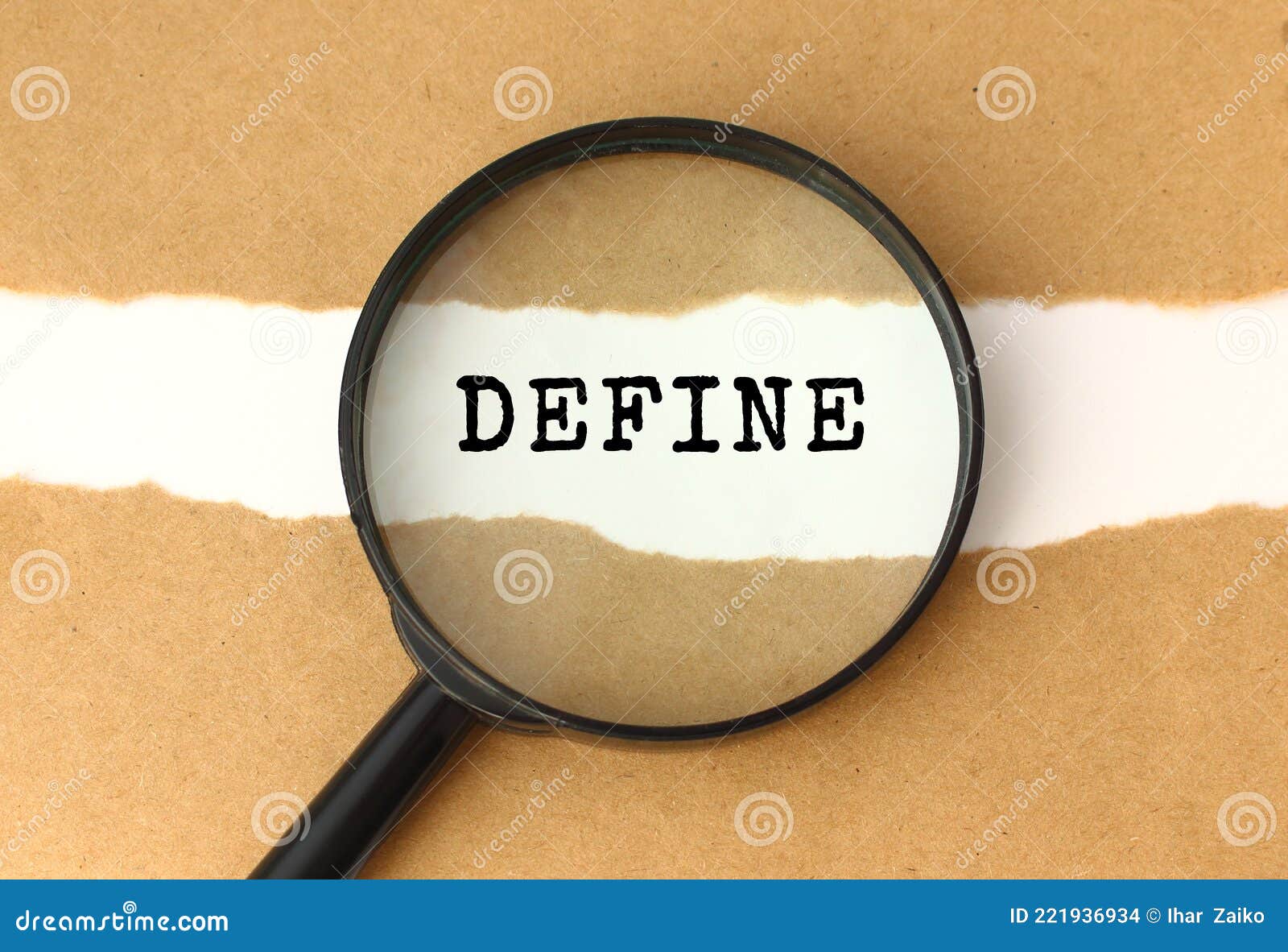 The Magnifying Glass Reveals The DEFINE Text Appearing Behind The Torn