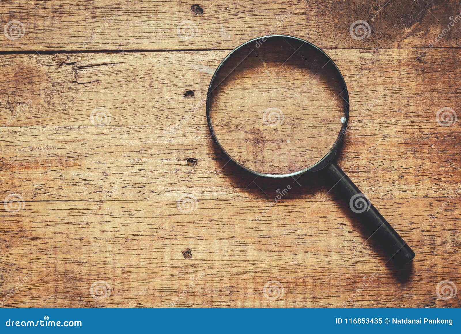 Magnifying Glass on Wooden Background Stock Image - Image of glass