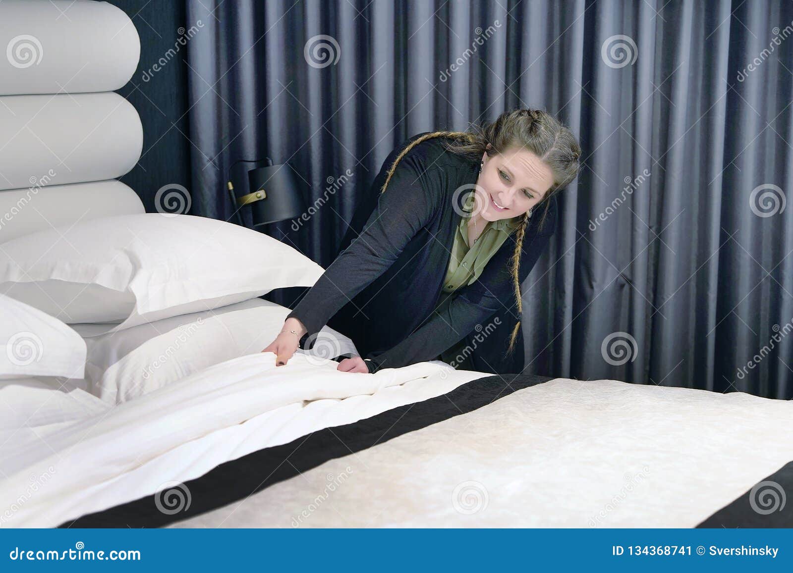 Maid Making Bed stock image. Image of hostel 134368741