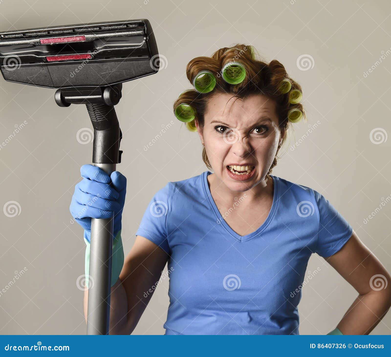 maid service woman or upset housewife in hair rollers cleaning g