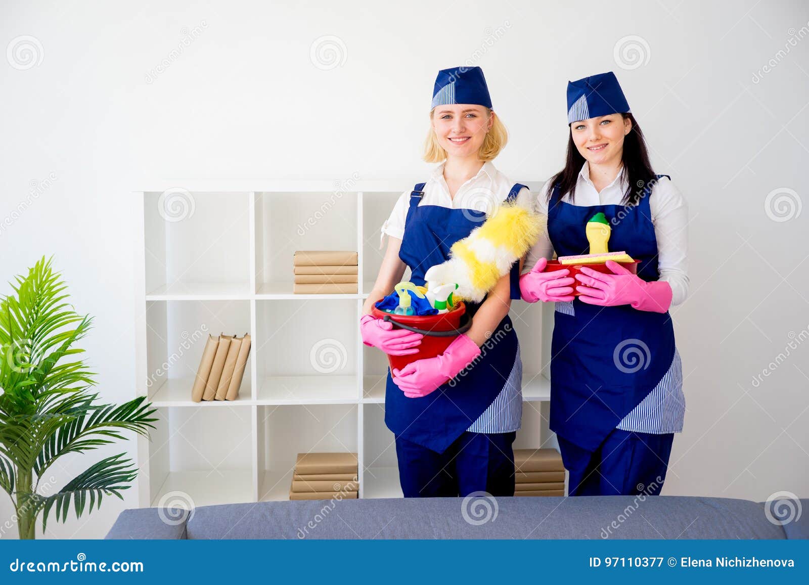 Maids of cleaning service stock image. Image of equipment 97110377
