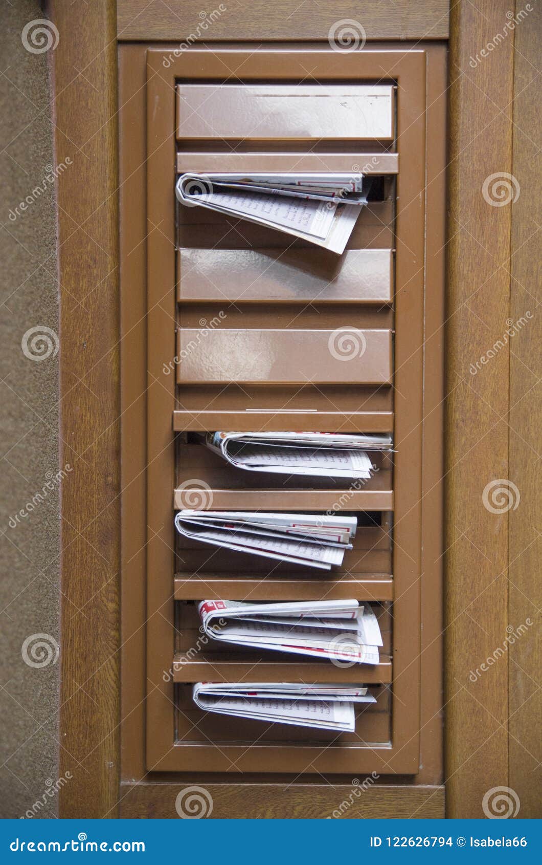 Mail Boxes Filled With Advertising Newspapers Stock Photo Image