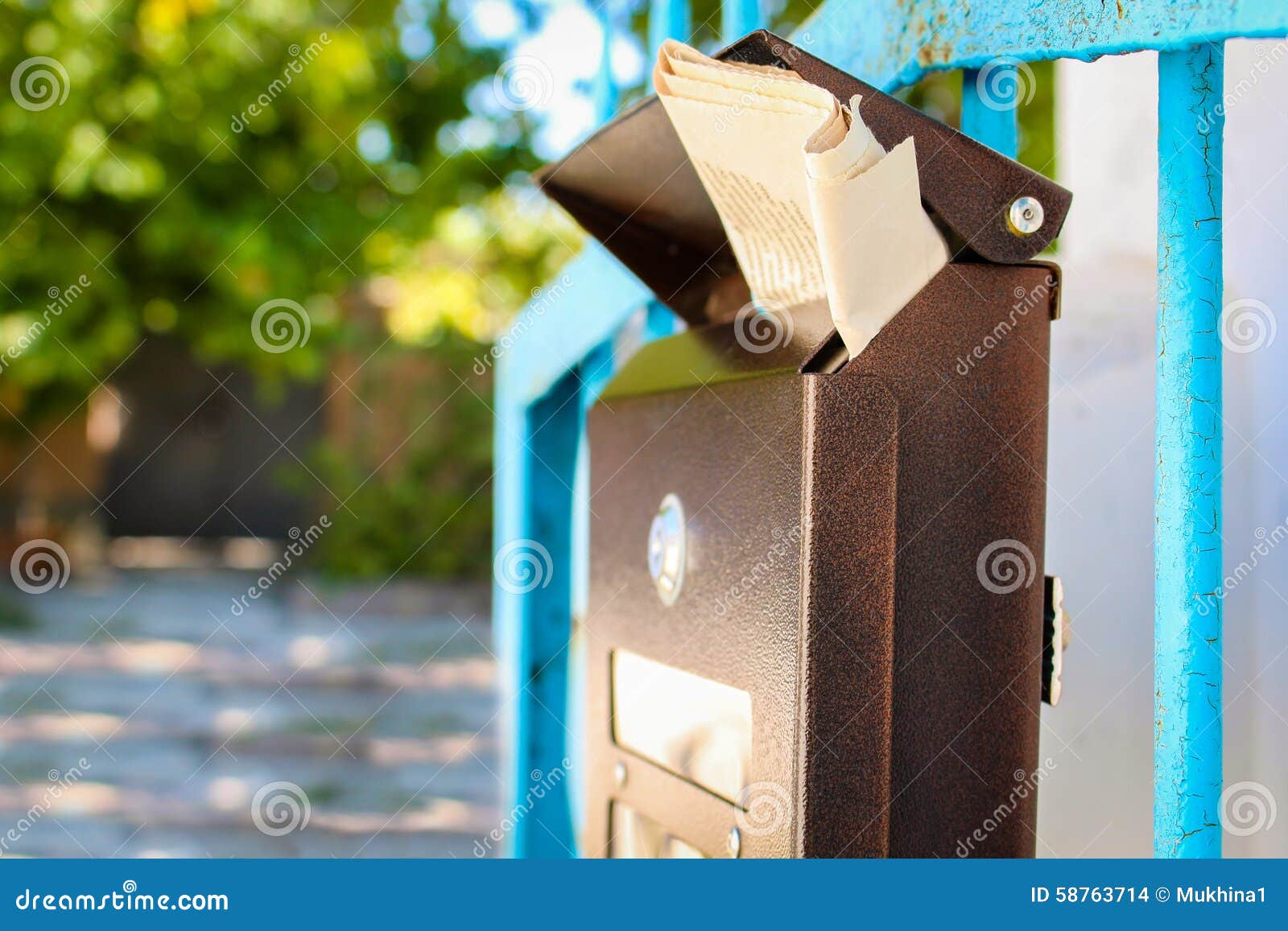 Mailbox with newspaper stock photo. Image of house, home 58763714