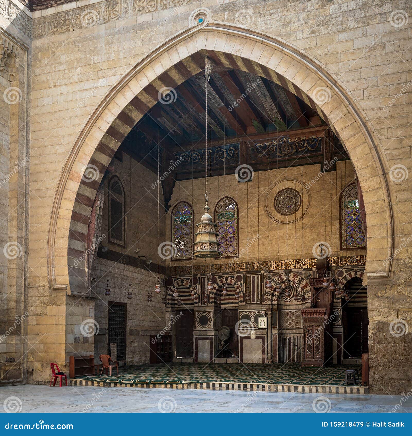 main iwan - arch - at the courtyard of historic mamluk era mosque of al ashraf barsbay, cairo, egypt