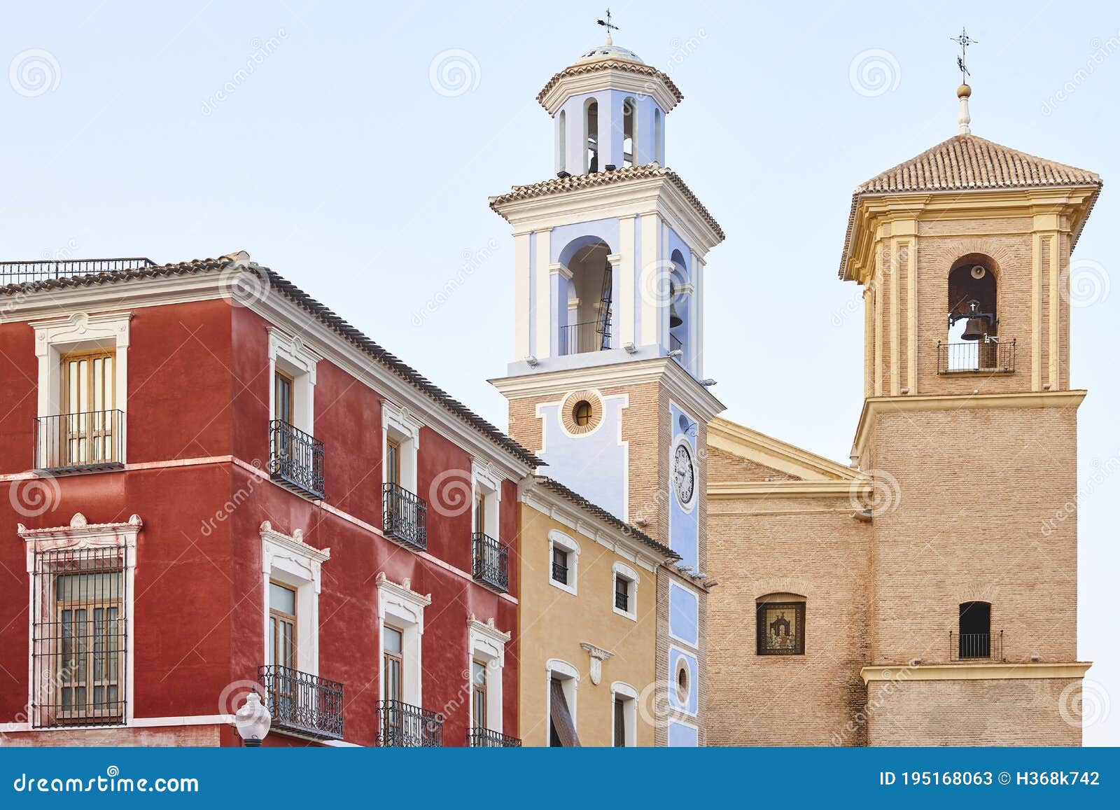 main square with picturesque buildings in mula village, murcia