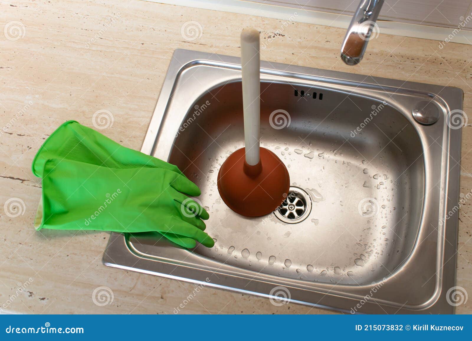 Happy Woman Looking At Male Plumber Using Plunger In The Kitchen Sink,  Stock Photo, Picture And Low Budget Royalty Free Image. Pic. ESY-048550729