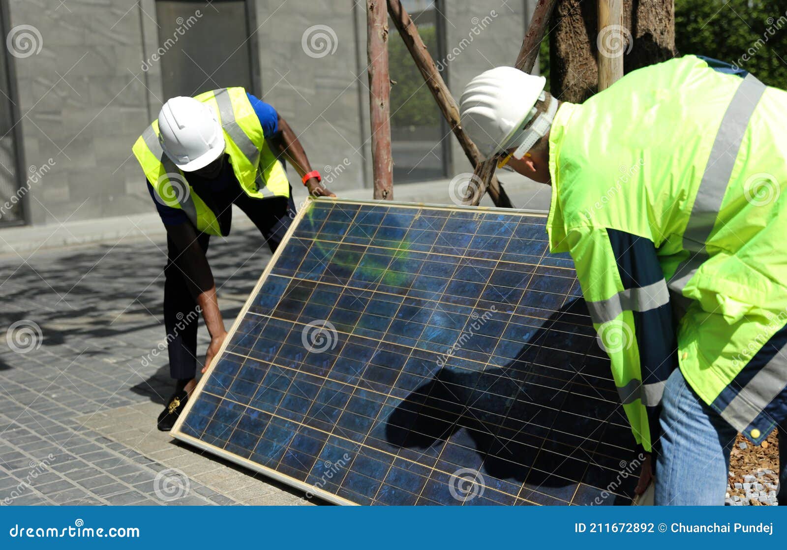 Portrait of Engineer Man or Worker, People, with Solar Panels or Solar