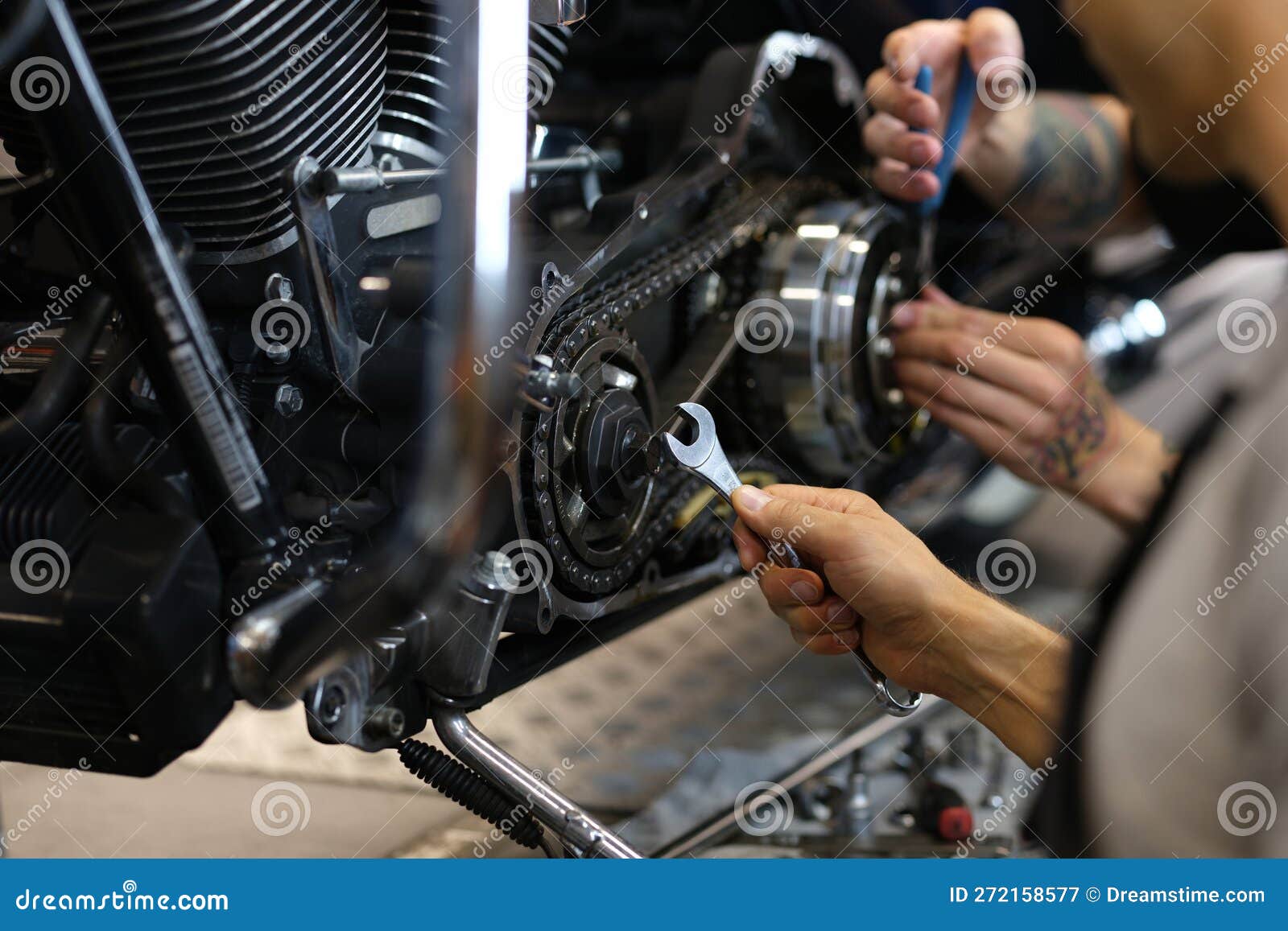 Maintenance of Motorcycle Engine Clutch System by Technicians Stock