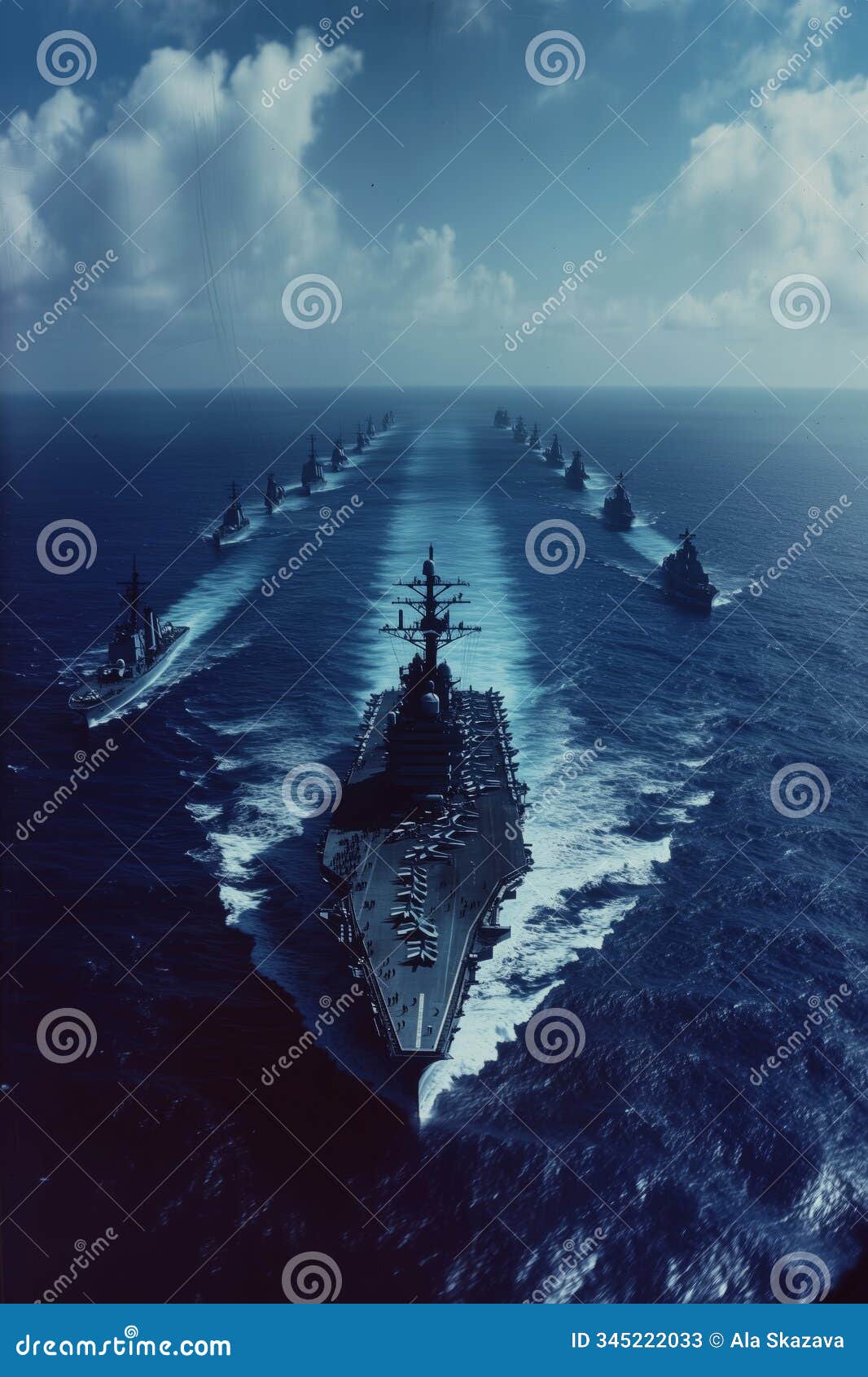 majestic american aircraft carrier leading naval vessels through azure waters