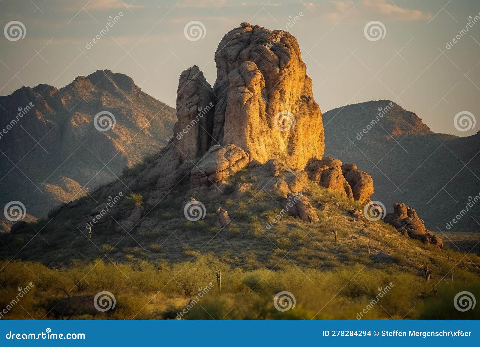 majestic rock formation in golden desert landscape