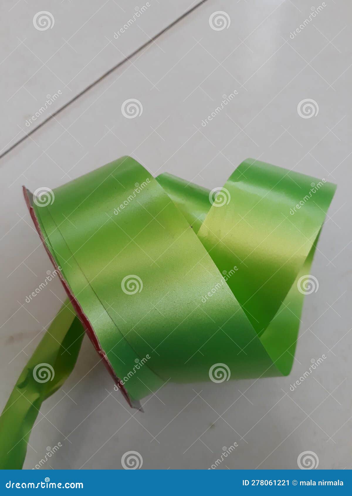 Make an Ornament Out of a Pretty Green Ribbon Part 2 Stock Image