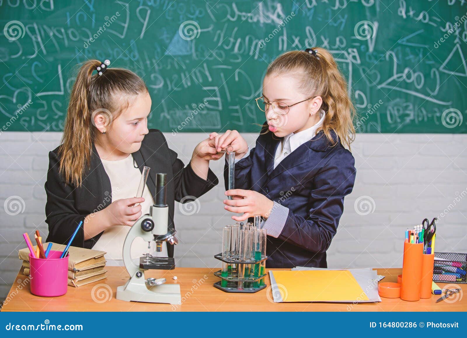Make Studying Chemistry Interesting. Educational Experiment Concept. Microscope and Test Tubes