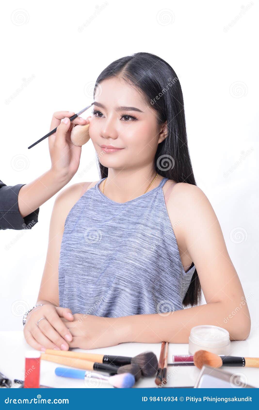 Makeup Artist is Working with Beautiful Model. Stock Photo Image of