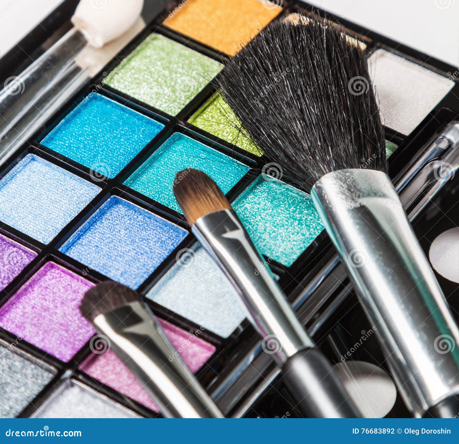 Makeup Colorful Eyeshadow Palettes with Makeup Brushes Stock Photo