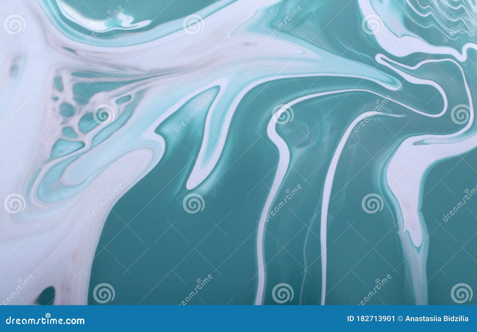 make up marble background.mixed nail polishes.abstract texture of the nail polish,fluid art technique.modern backdrop.copy space