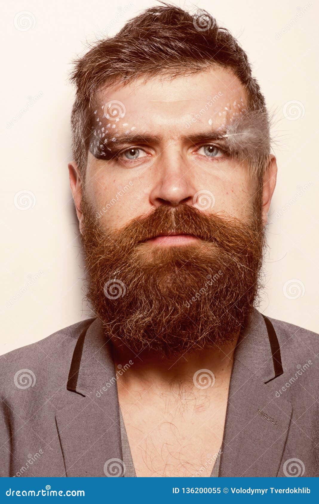 Makeup And Make Up. Bearded Man With Creative Makeup And Feather. Man