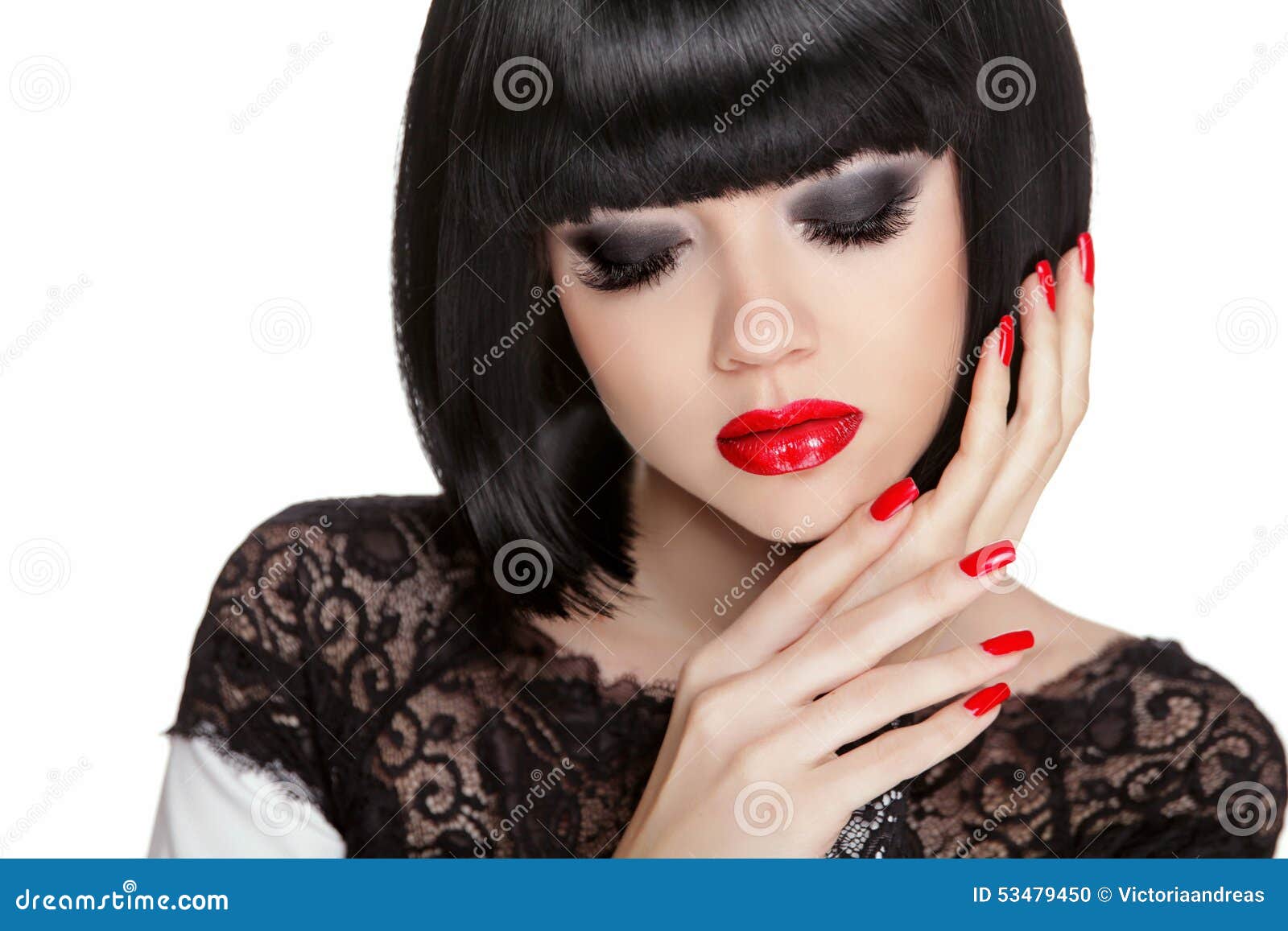 makeup. manicured nails. black bob short hair styling. brunette