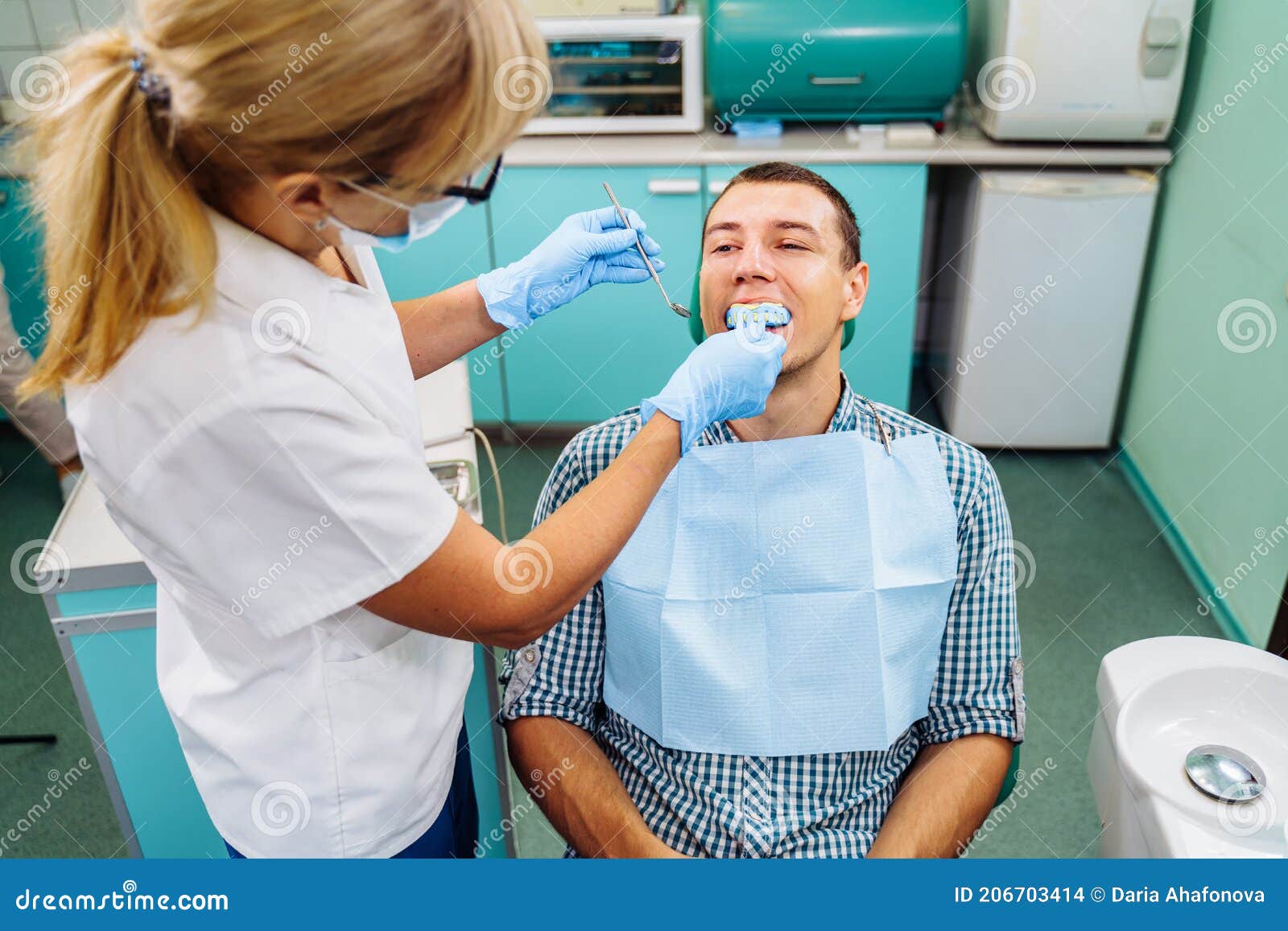 Making Cast of the Upper Row of Teeth Using a Special Plate and Soft