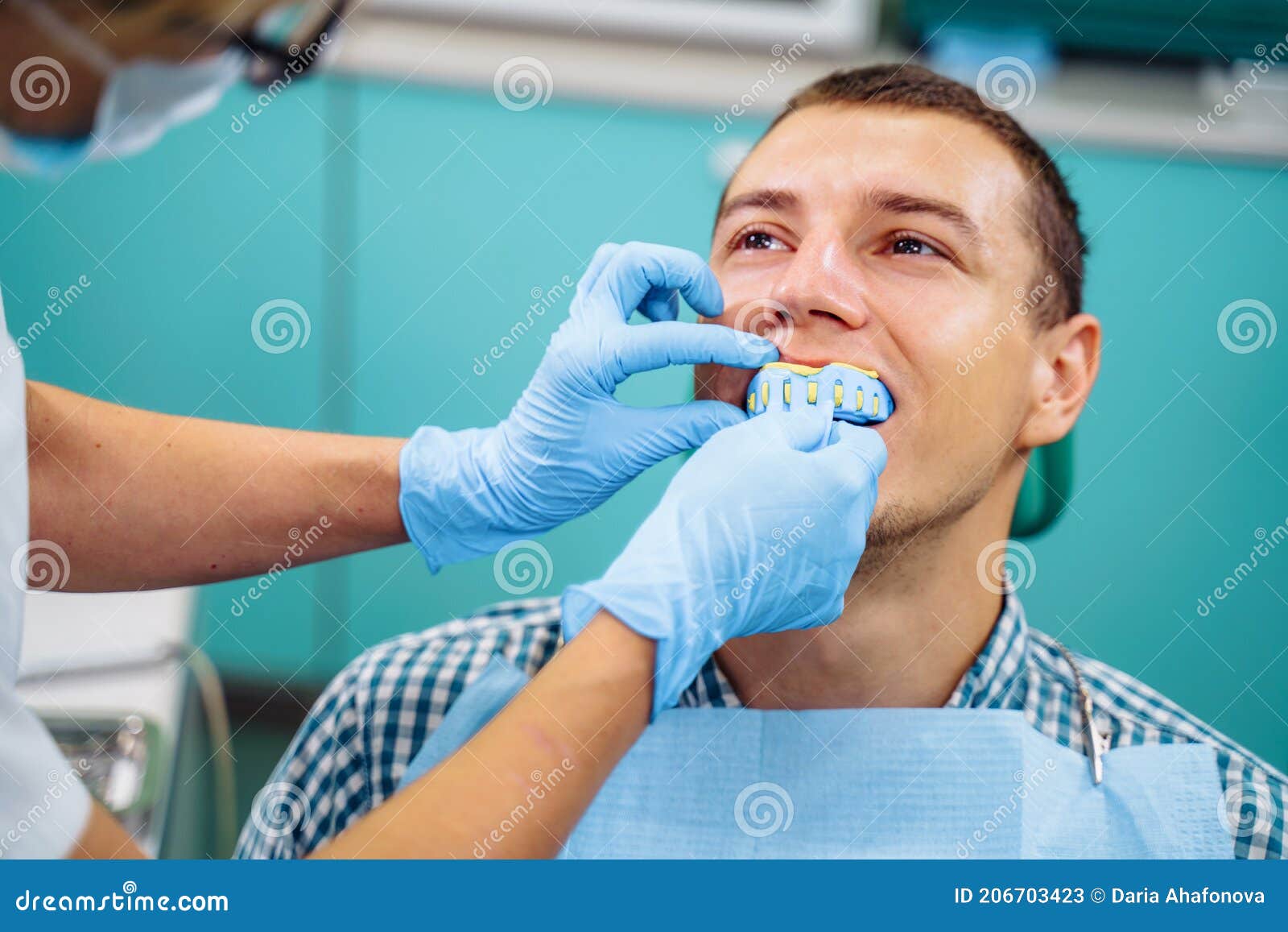 Making Cast of the Upper Row of Teeth Using a Special Plate and Soft