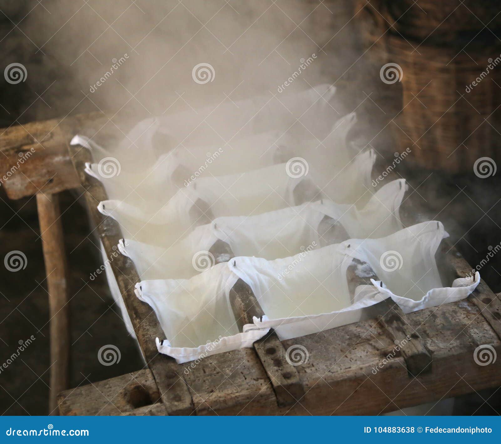 Making Cheese in a Cheese Factory in the Mountain Hut Stock Photo