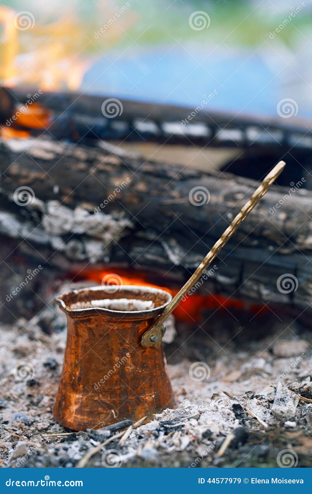 Making Coffee in the Fireplace on Camping or Hiking in the Natu Stock