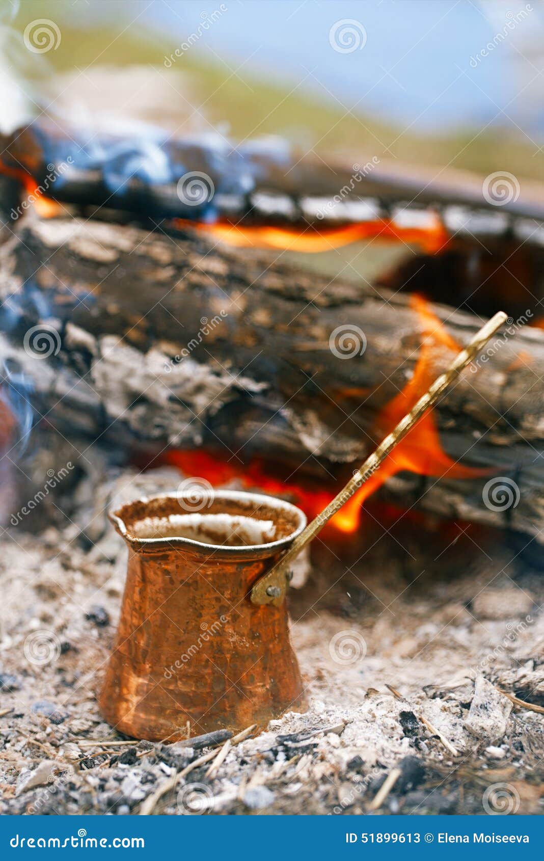 Making Coffee in the Fireplace on Camping or Hiking in the Natu Stock