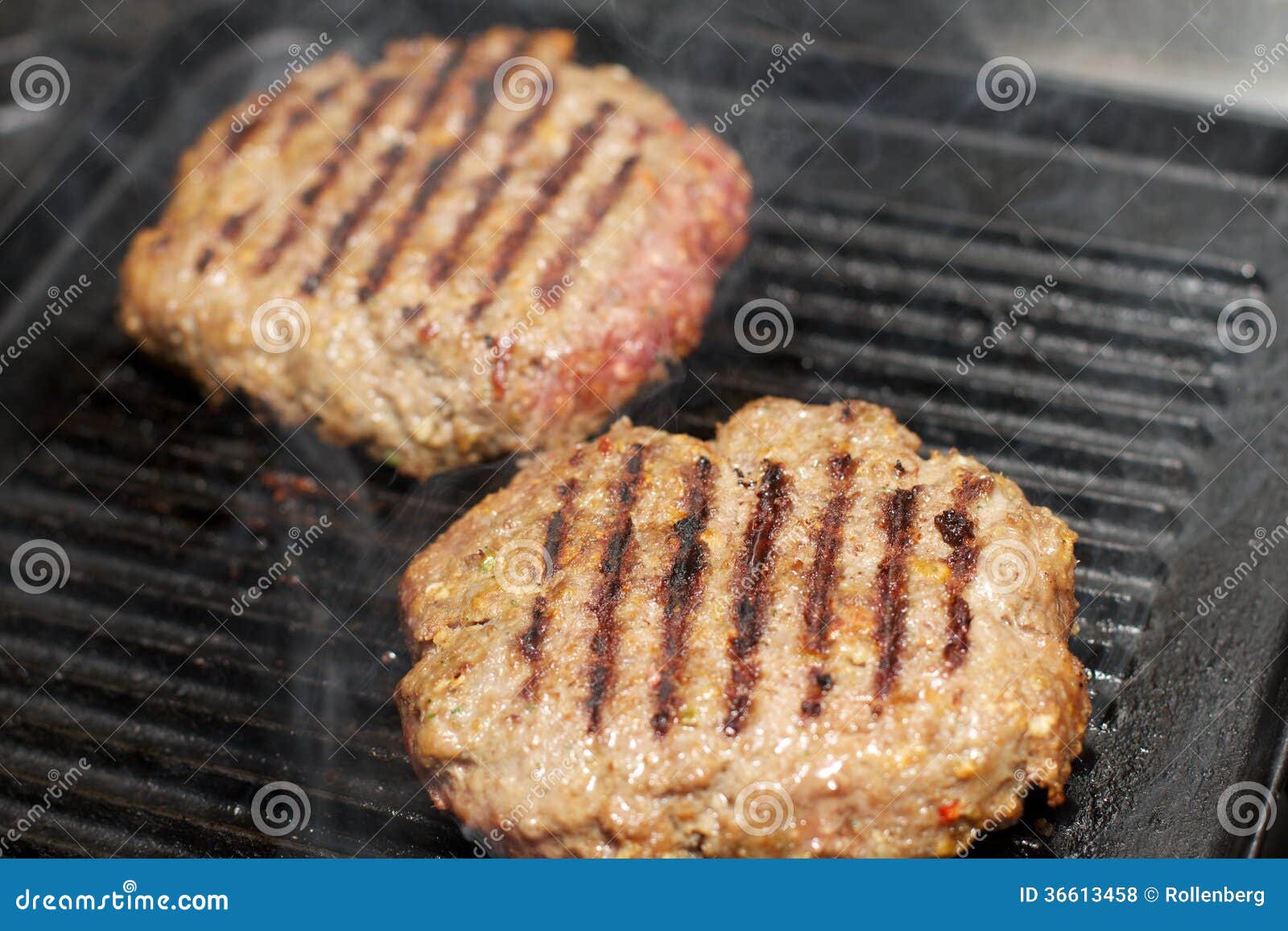Making a grilled hamburger stock photo. Image of grilling 36613458